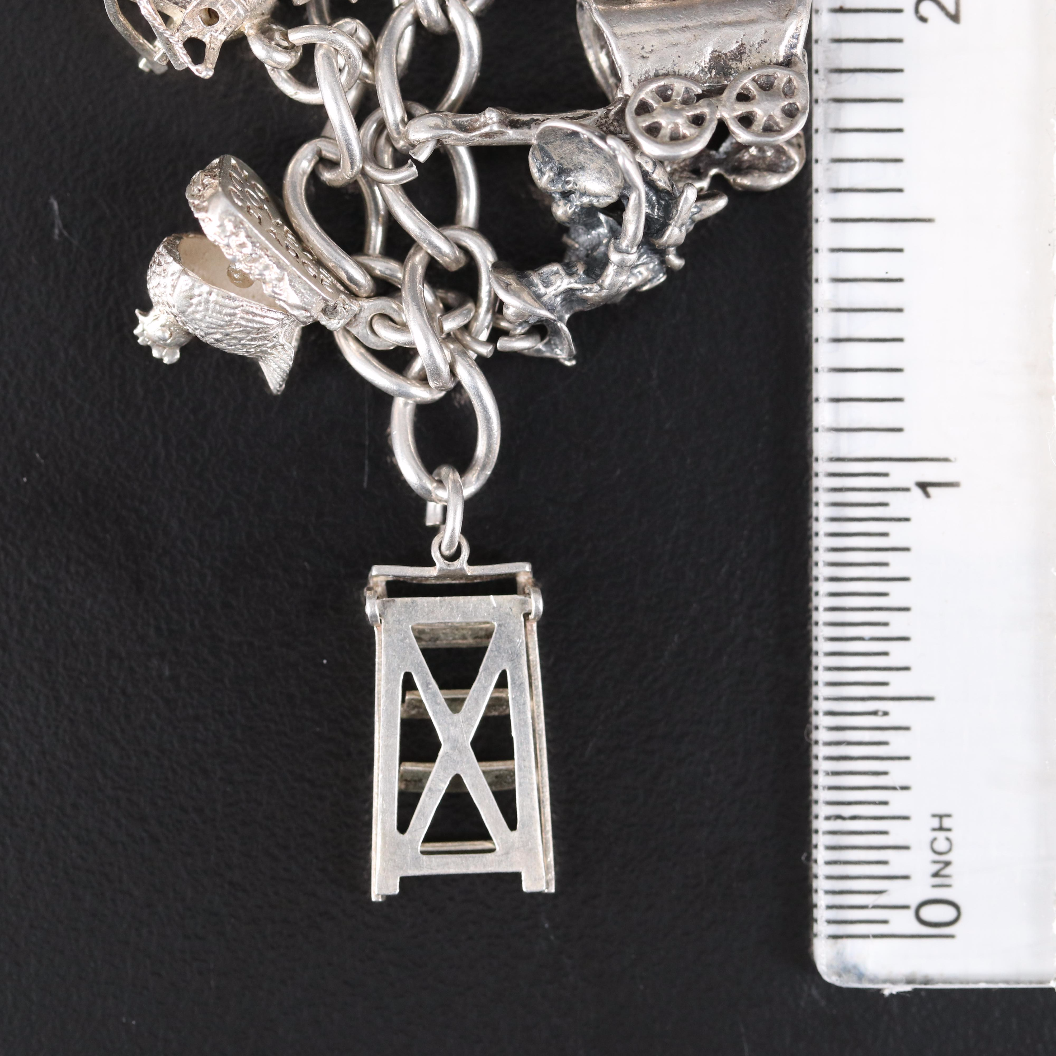 Vintage Sterling Charm Bracelet Including Articulation, Enamel and Turquoise