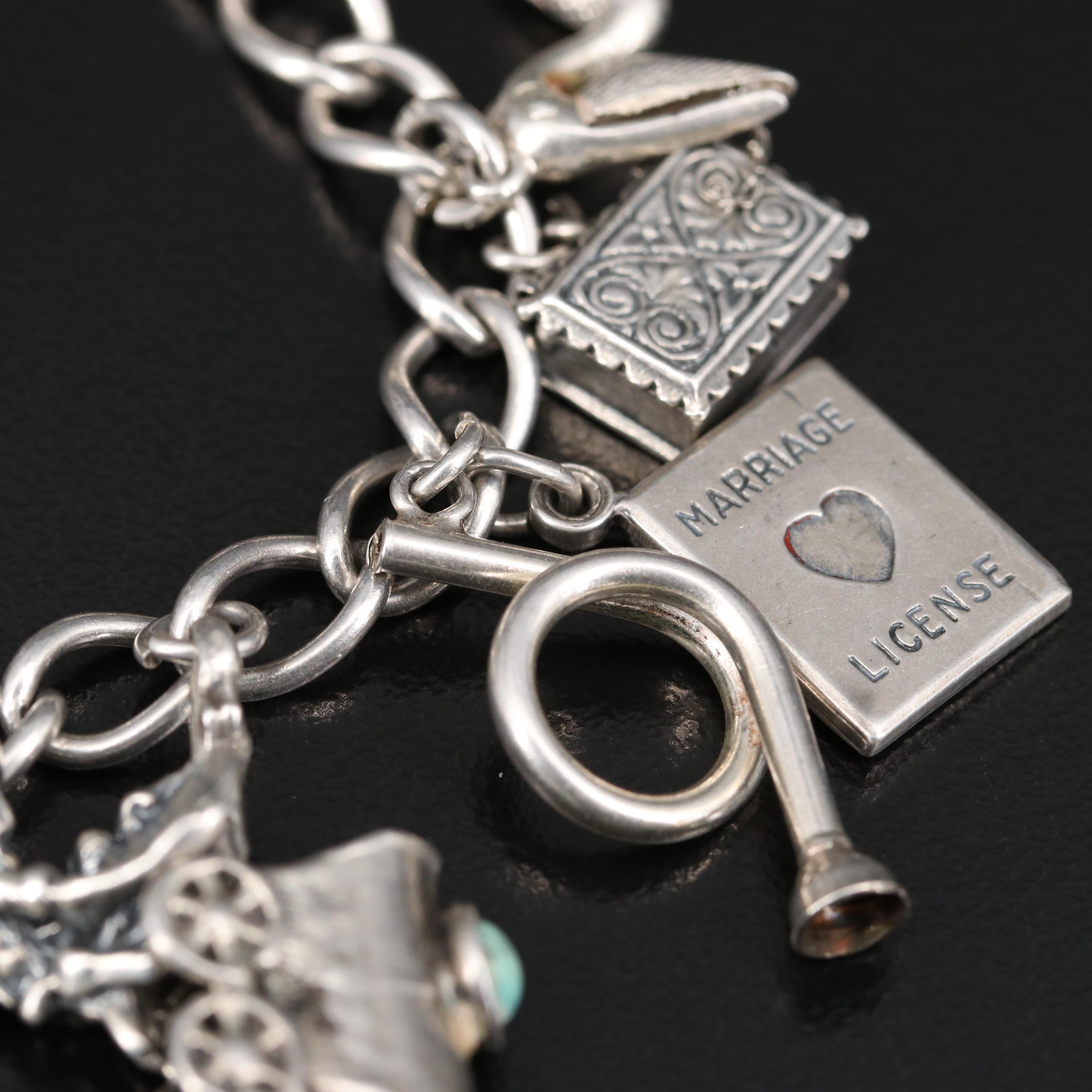 Vintage Sterling Charm Bracelet Including Articulation, Enamel and Turquoise