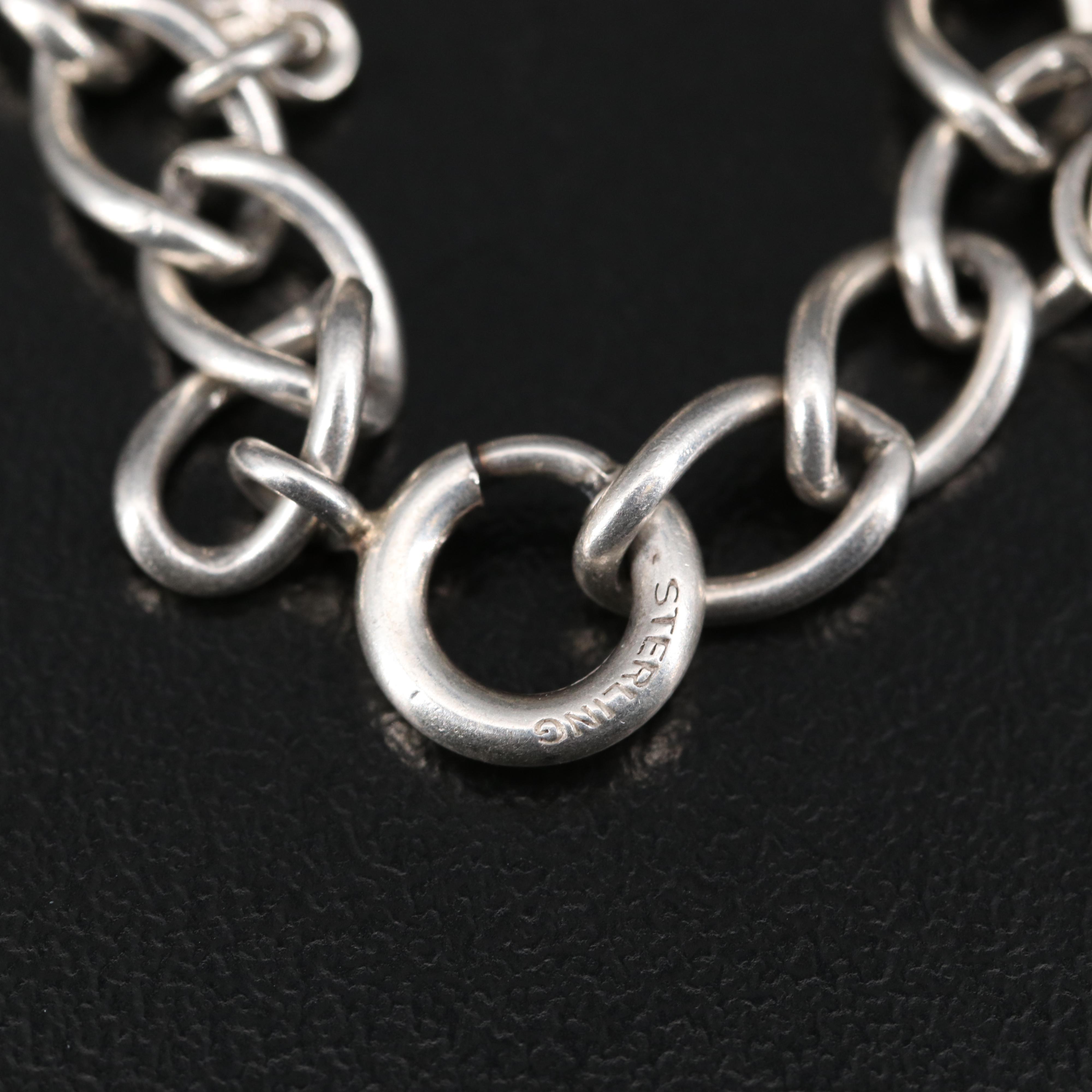 Vintage Sterling Charm Bracelet Including Articulation, Enamel and Turquoise