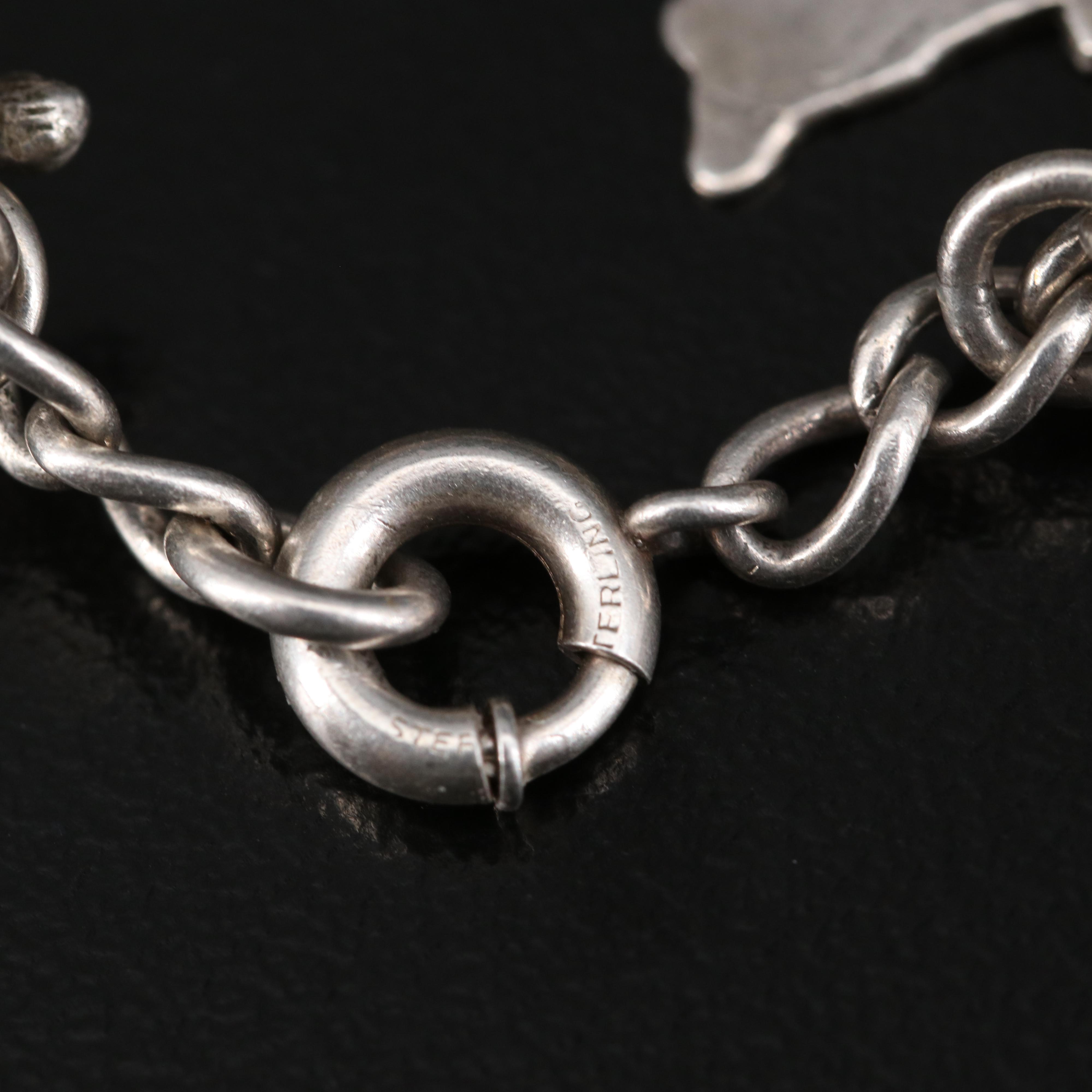 Vintage Sterling Silver Charm Bracelet Featuring Hawaiian Theme