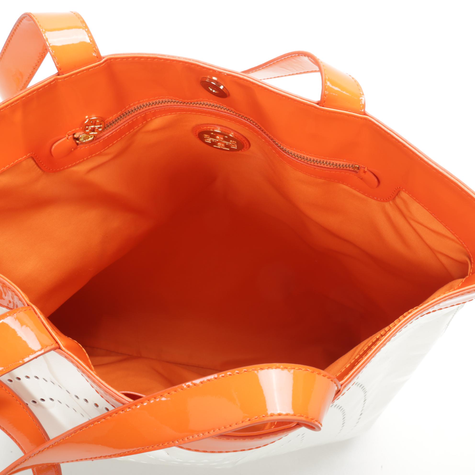 Tory Burch Tote in White Perforated and Orange Patent Leather