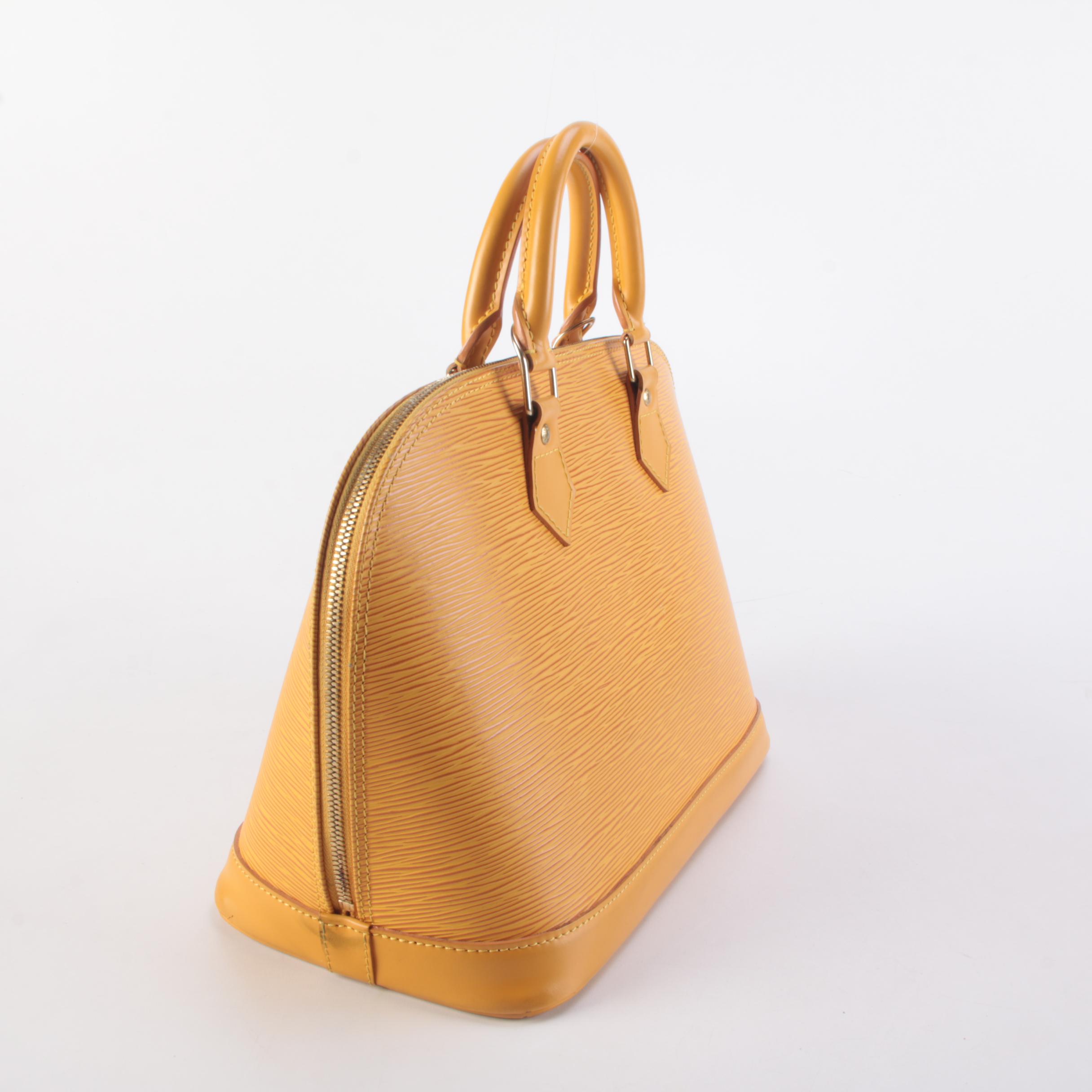Louis Vuitton Alma Top Handle Bag in Tassil Yellow Epi Leather
