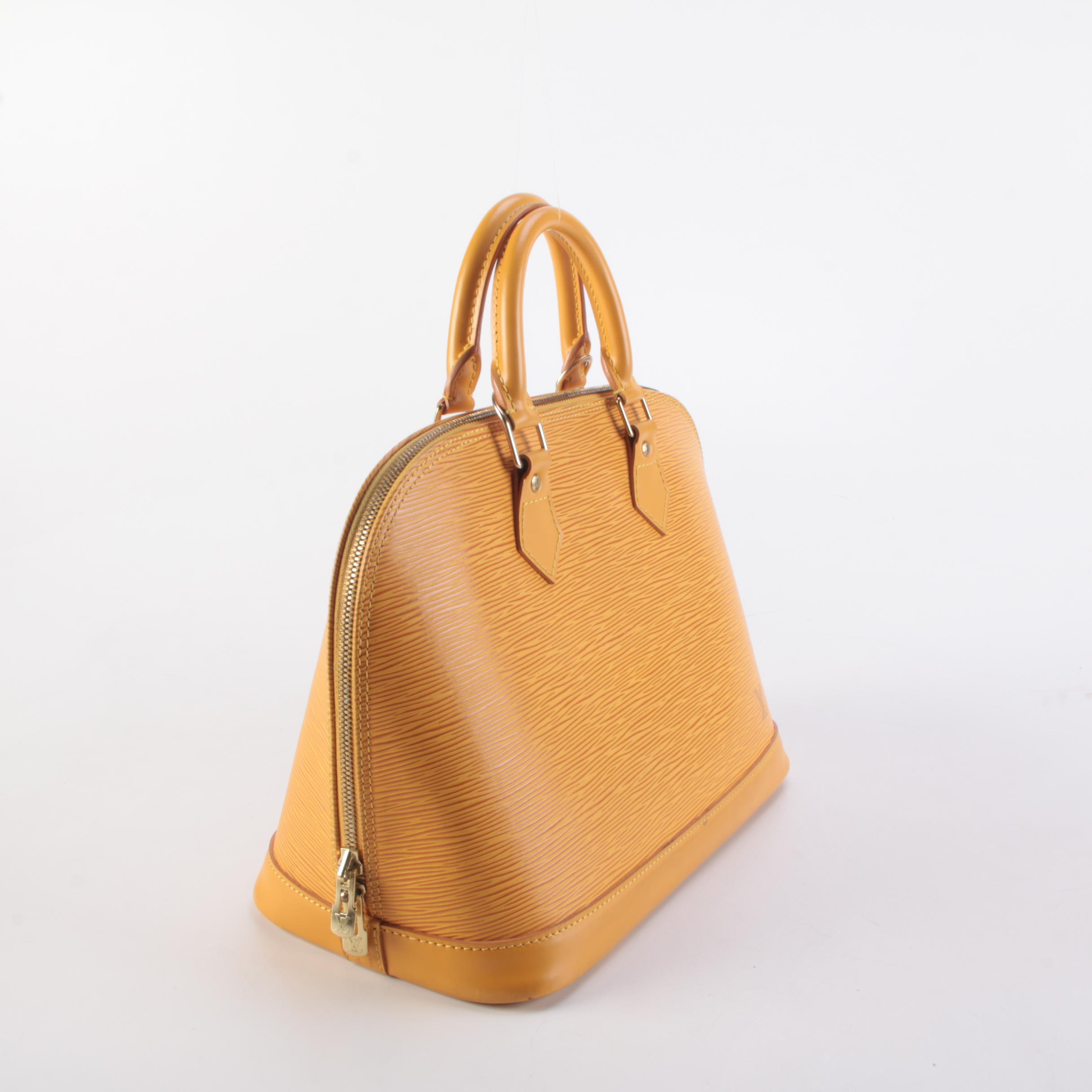 Louis Vuitton Alma Top Handle Bag in Tassil Yellow Epi Leather
