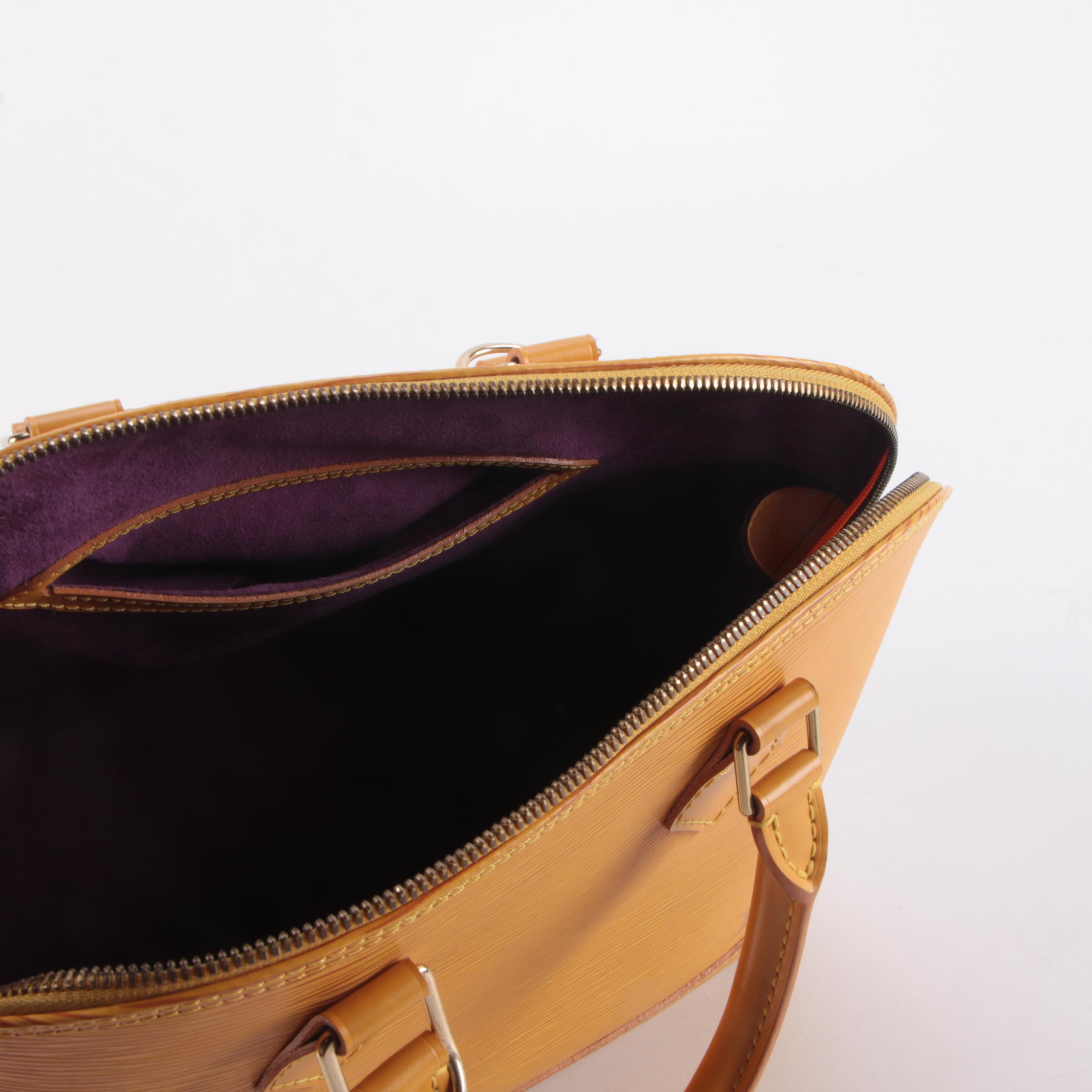 Louis Vuitton Alma Top Handle Bag in Tassil Yellow Epi Leather