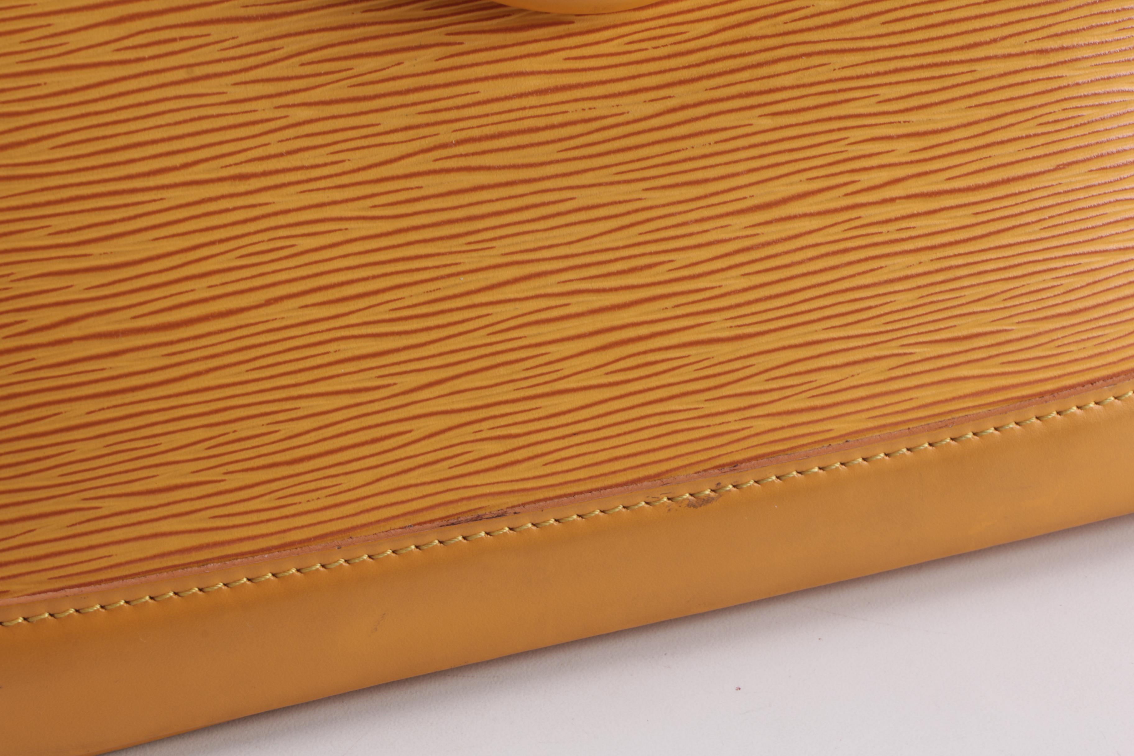 Louis Vuitton Alma Top Handle Bag in Tassil Yellow Epi Leather