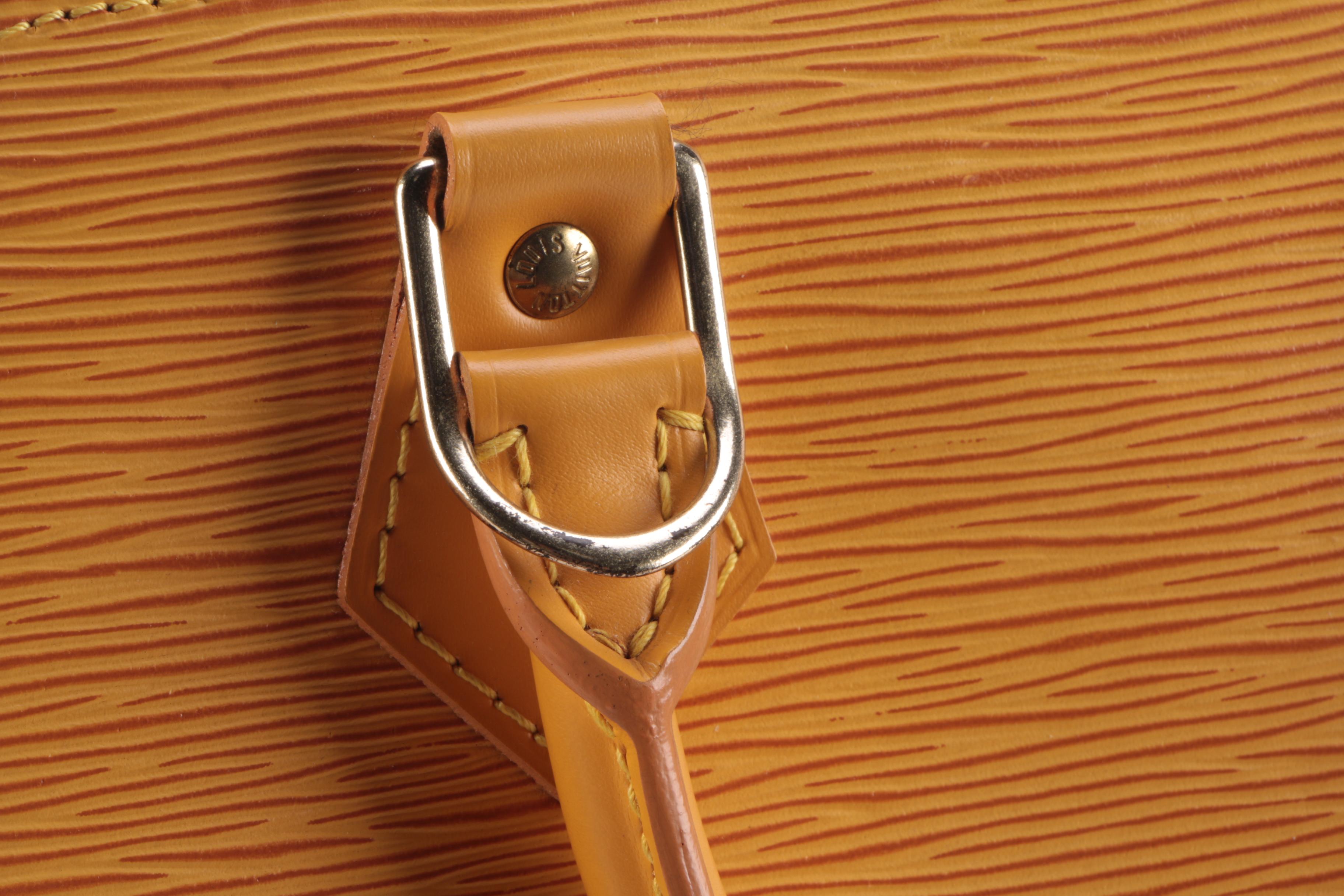 Louis Vuitton Alma Top Handle Bag in Tassil Yellow Epi Leather