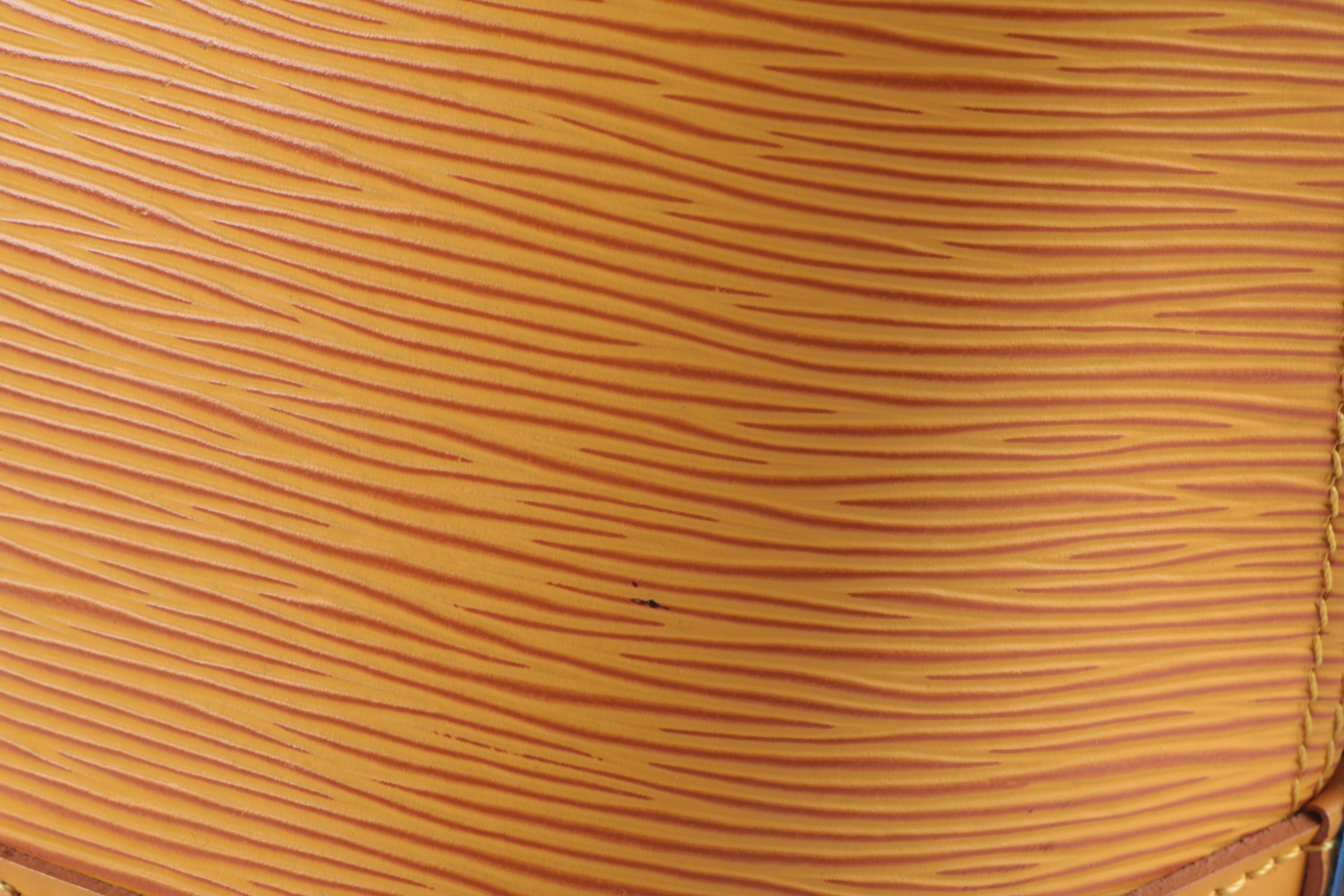 Louis Vuitton Alma Top Handle Bag in Tassil Yellow Epi Leather