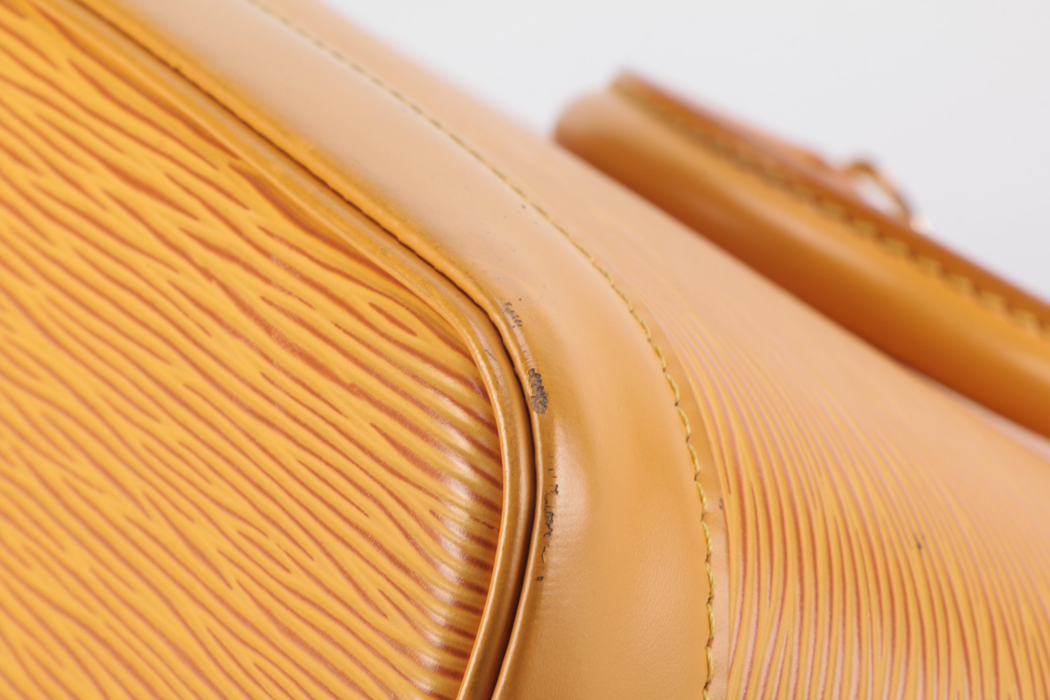 Louis Vuitton Alma Top Handle Bag in Tassil Yellow Epi Leather