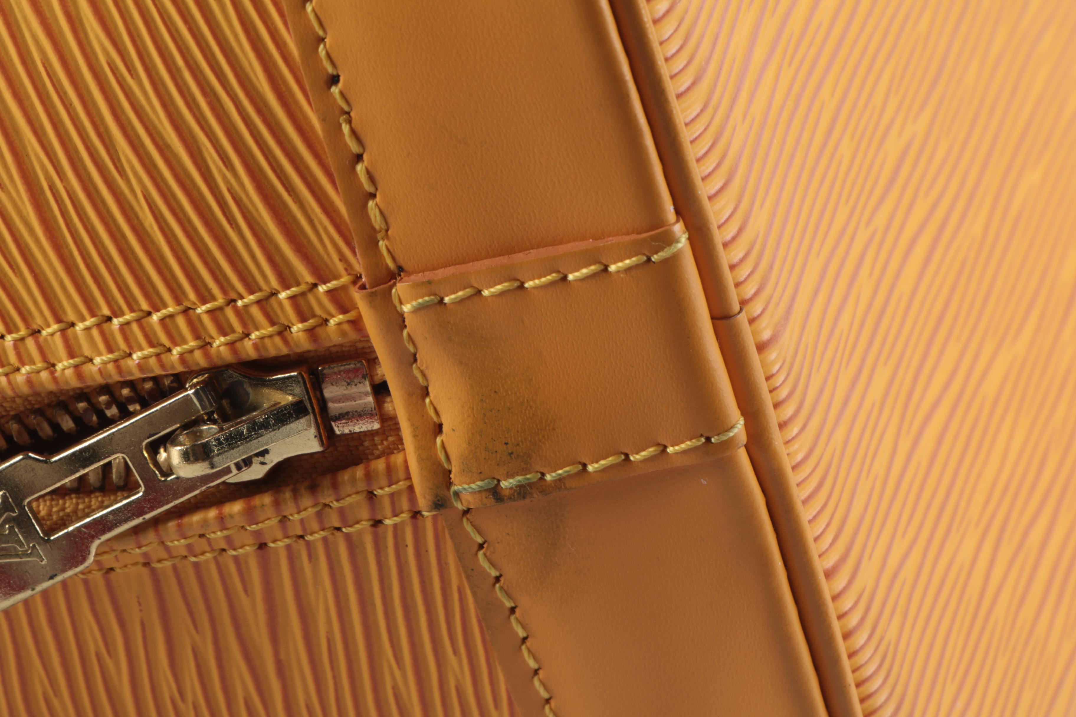 Louis Vuitton Alma Top Handle Bag in Tassil Yellow Epi Leather