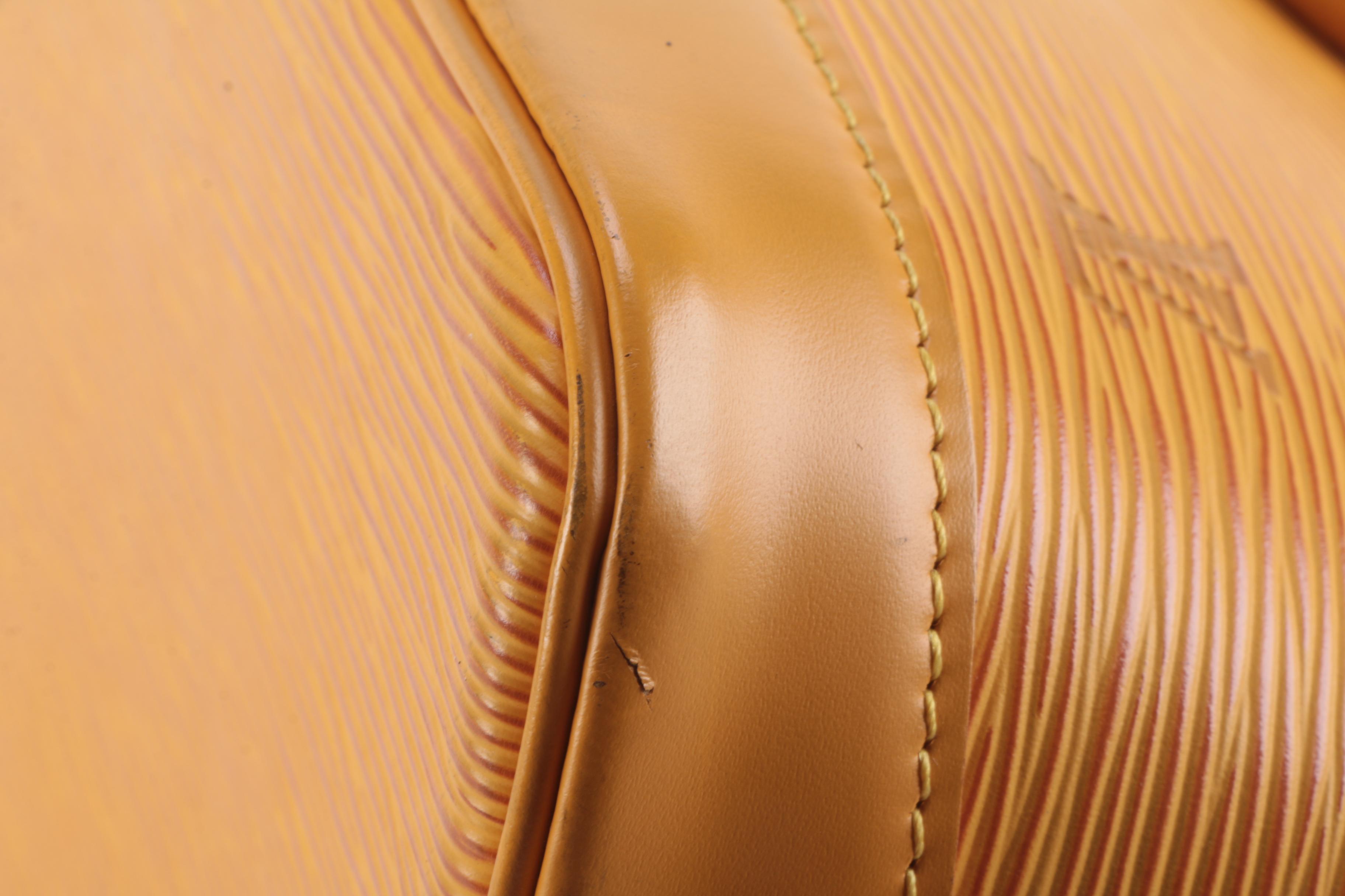 Louis Vuitton Alma Top Handle Bag in Tassil Yellow Epi Leather