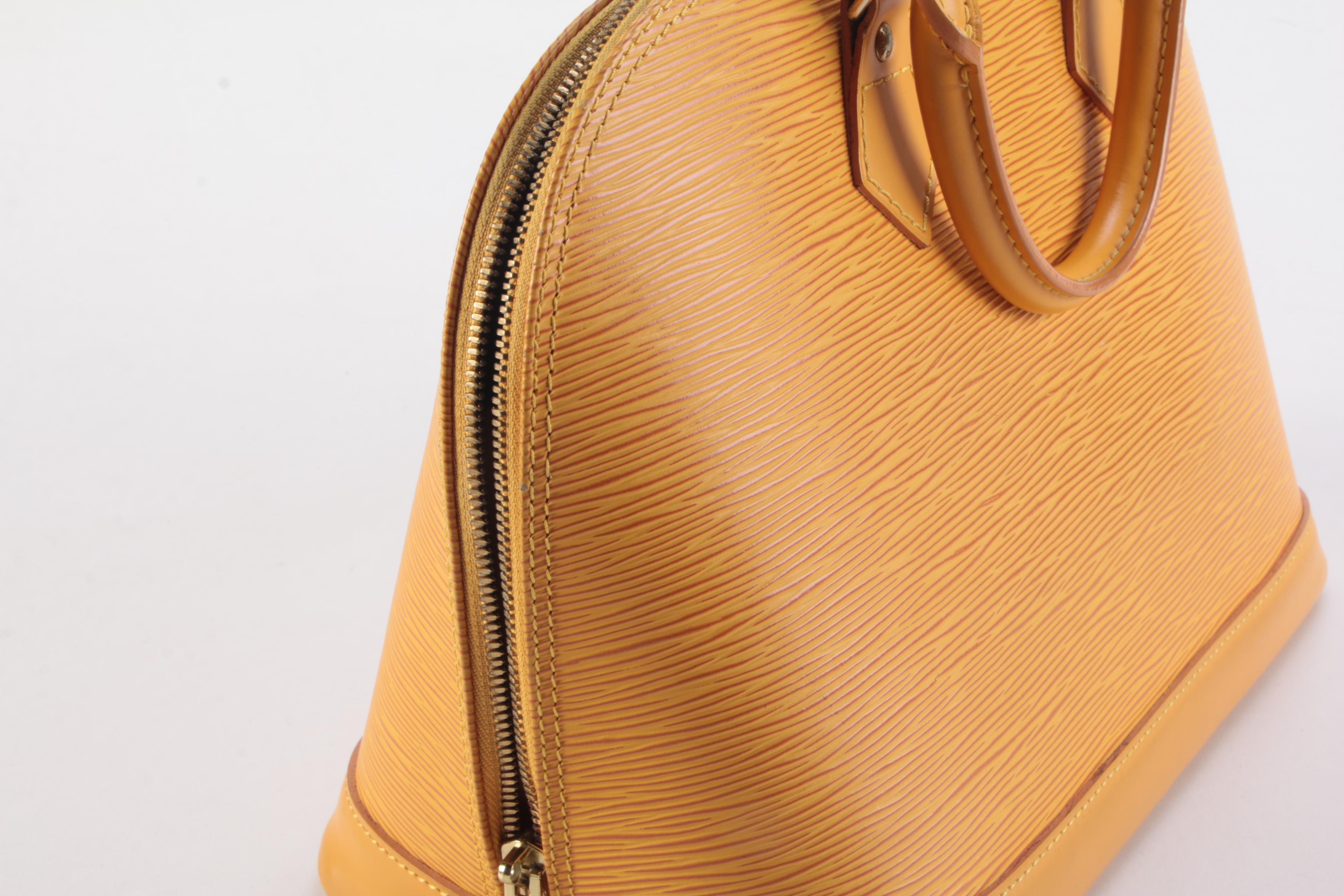 Louis Vuitton Alma Top Handle Bag in Tassil Yellow Epi Leather