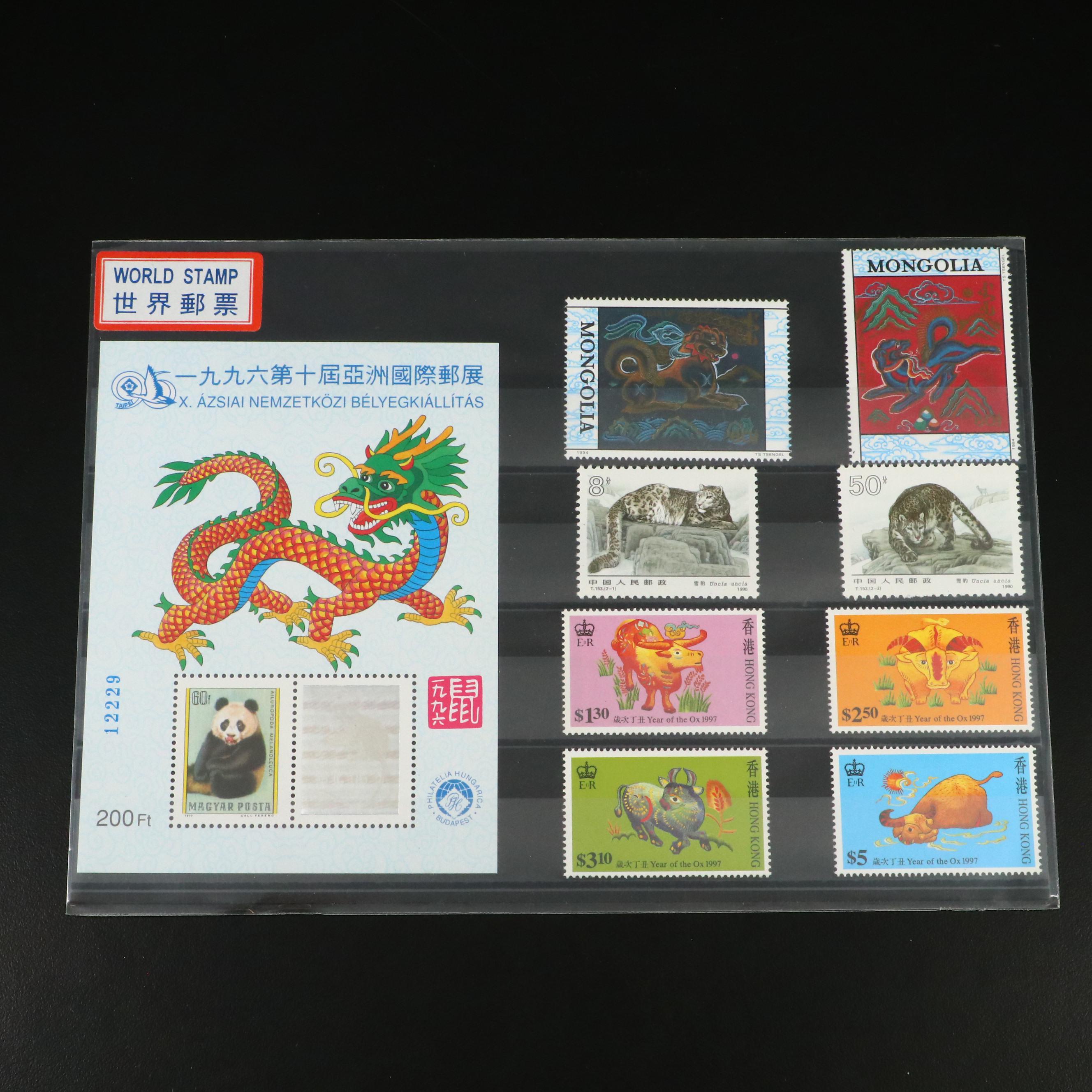 Twelve Sets of U.S. and Foreign Stamps