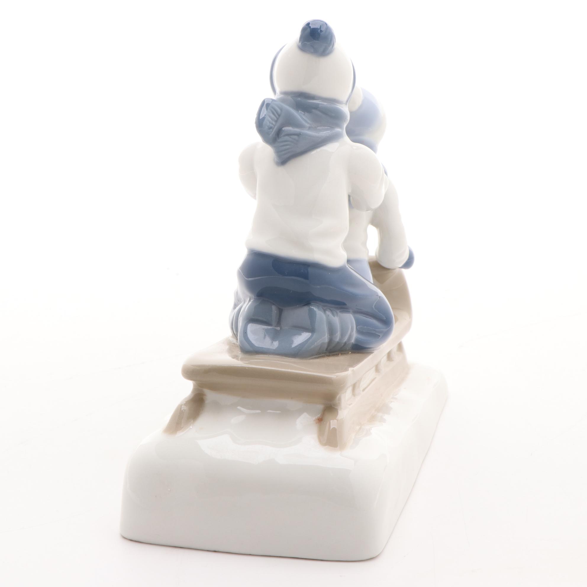 Paul Sebastian Porcelain Sledding Figurine, Late 20th Century