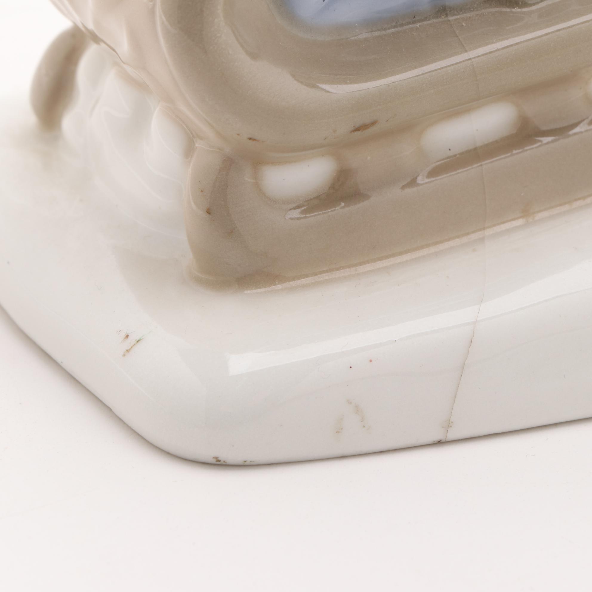 Paul Sebastian Porcelain Sledding Figurine, Late 20th Century