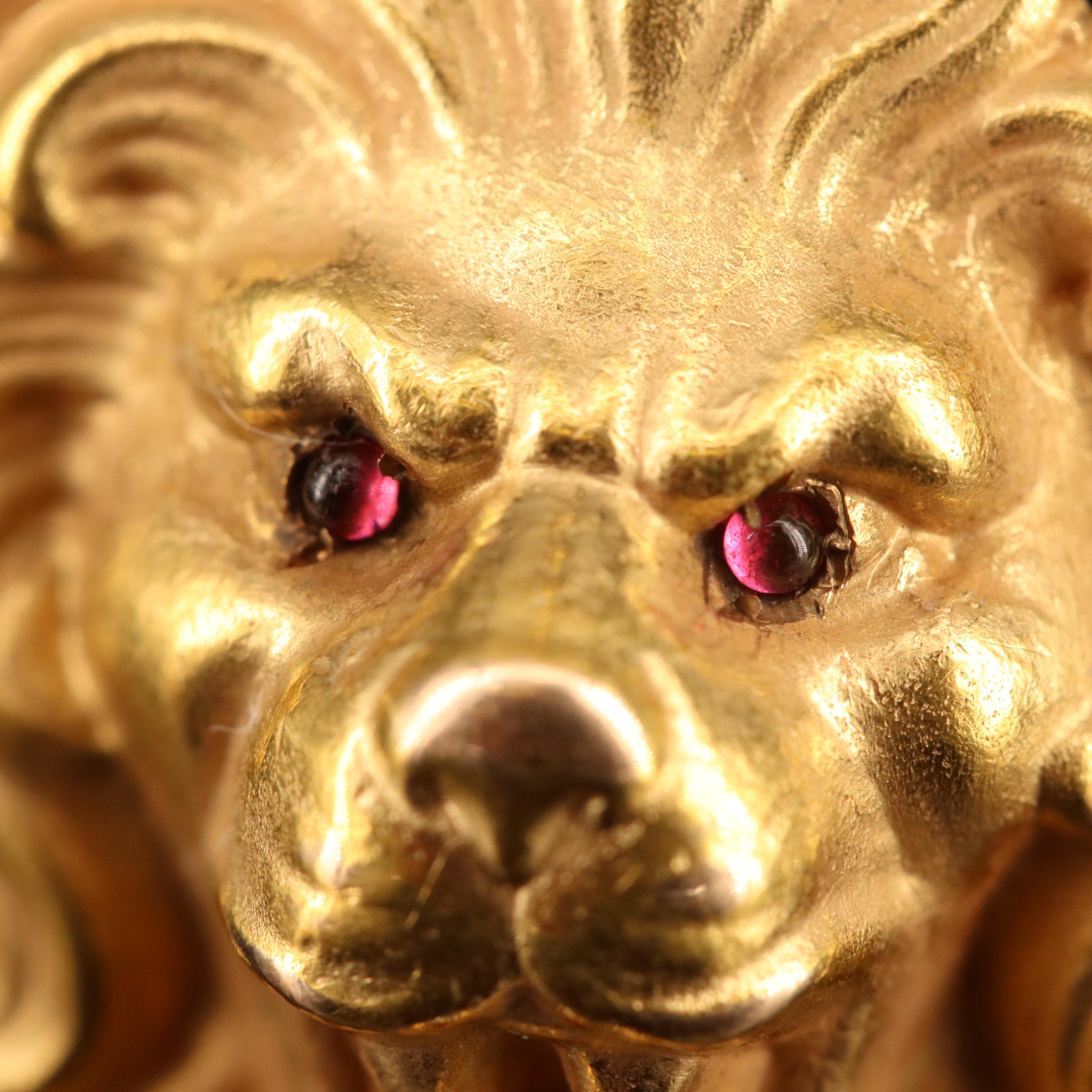 Antique 10K Sapphire and Glass Hinged Lion Bangle with Scroll Pattern