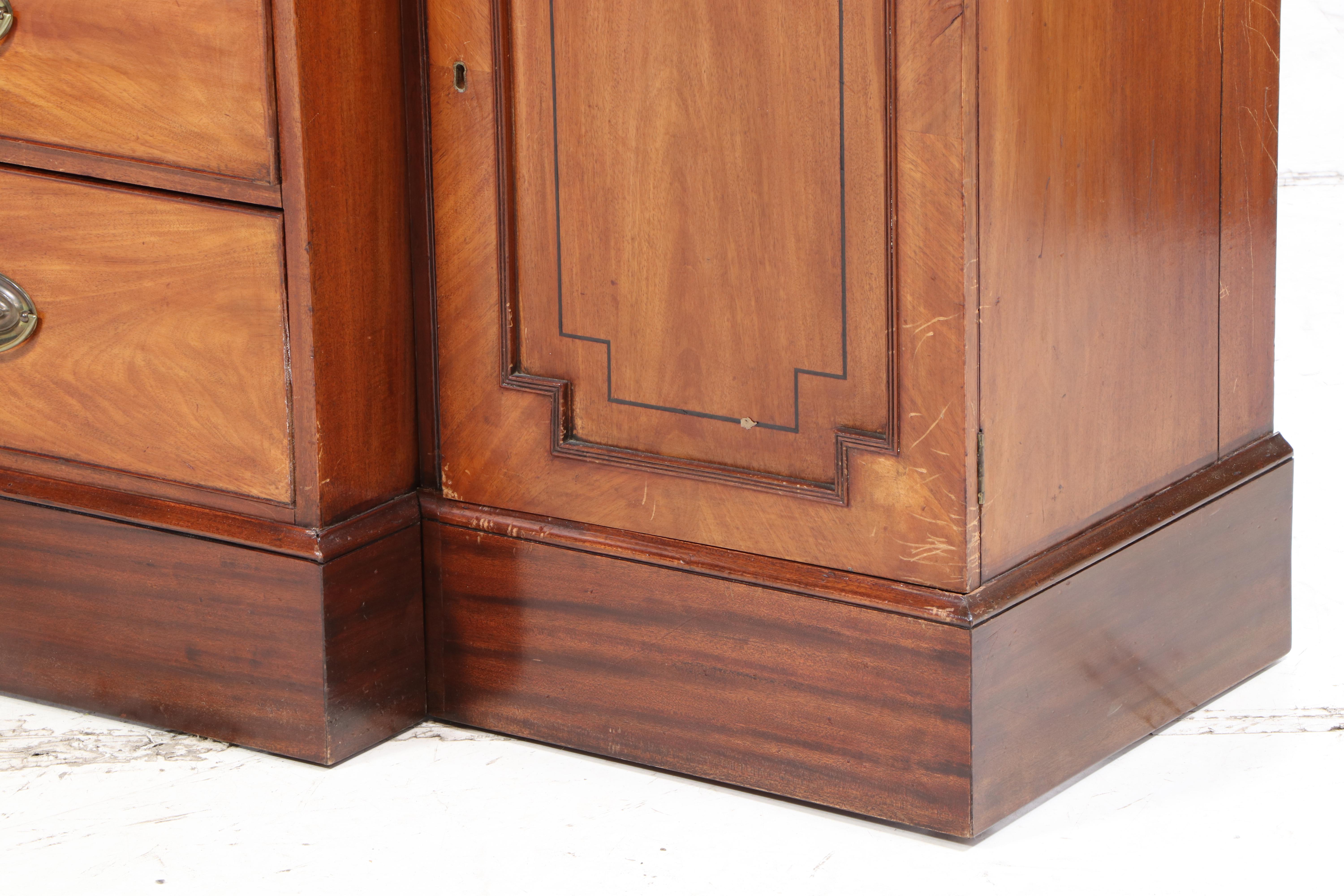 George III Mahogany and String-Inlaid Breakfront Bookcase, circa 1800