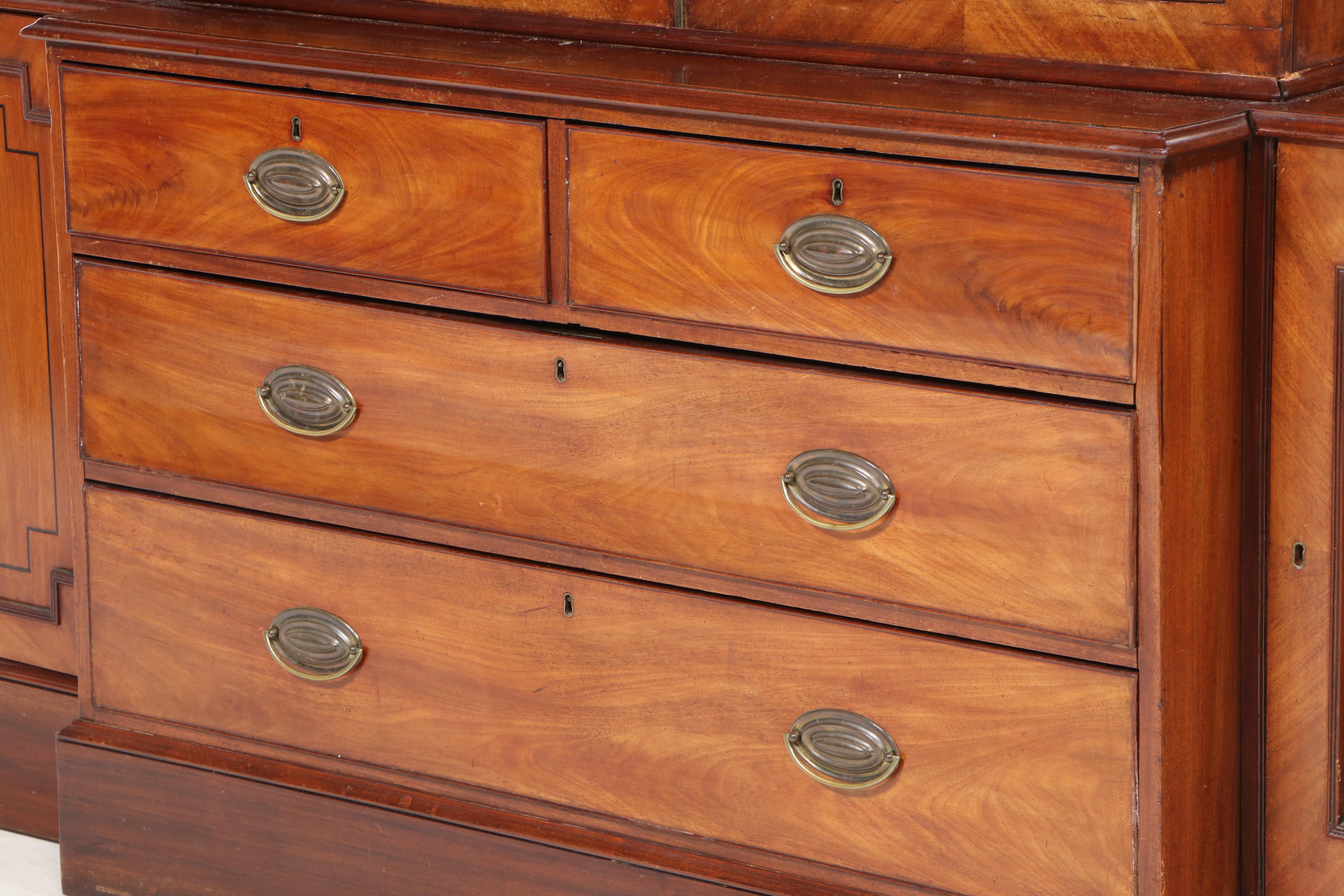 George III Mahogany and String-Inlaid Breakfront Bookcase, circa 1800