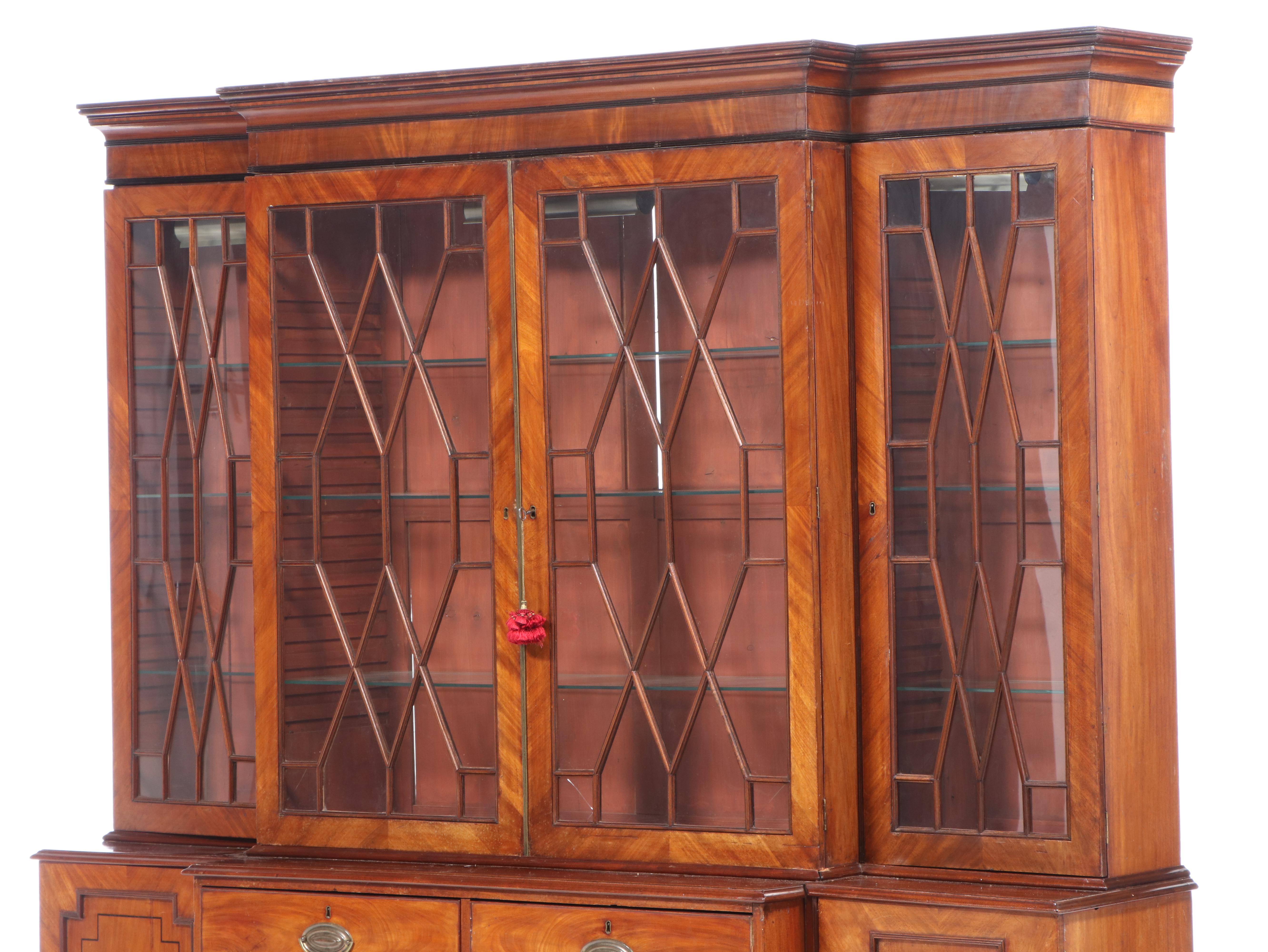 George III Mahogany and String-Inlaid Breakfront Bookcase, circa 1800