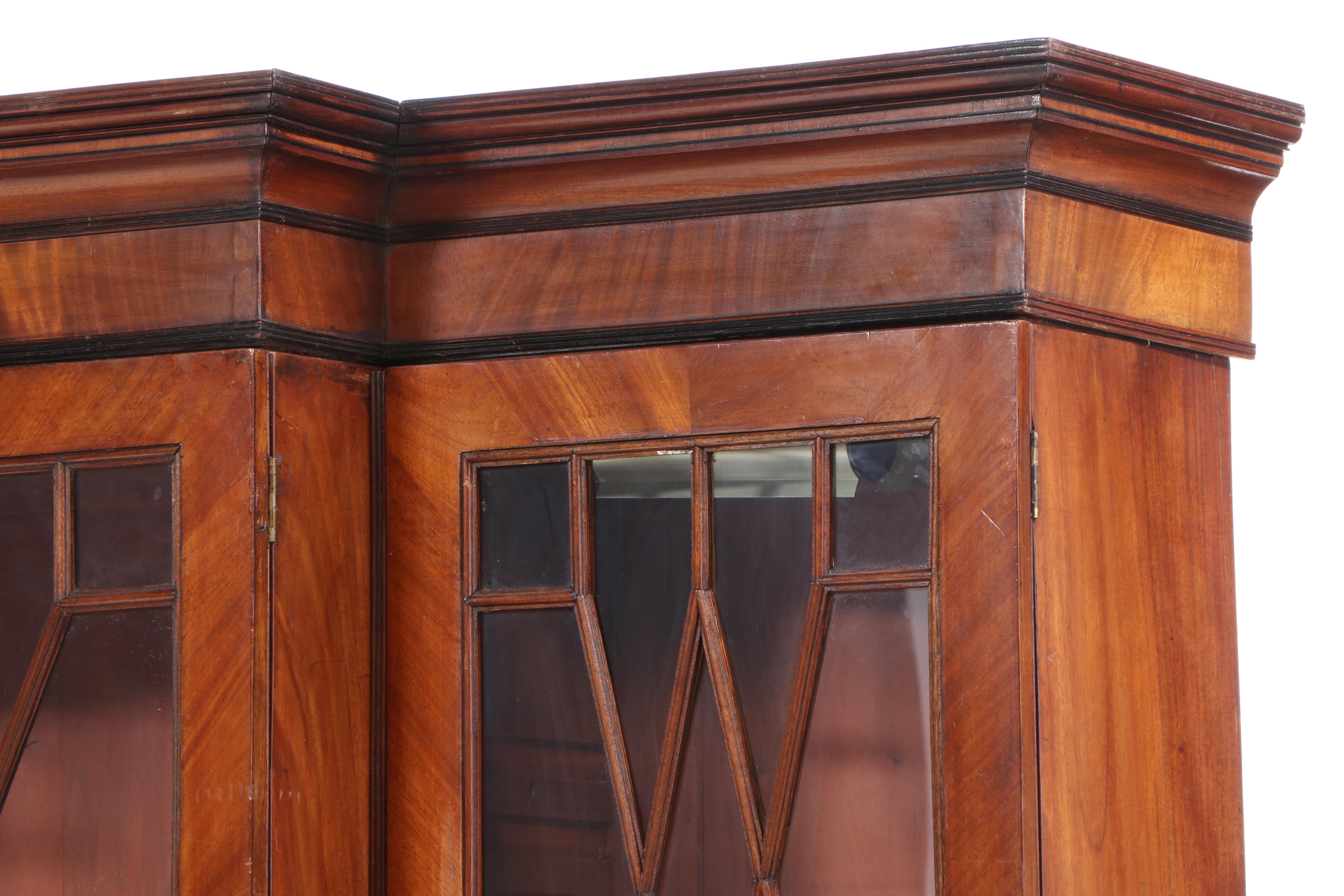 George III Mahogany and String-Inlaid Breakfront Bookcase, circa 1800
