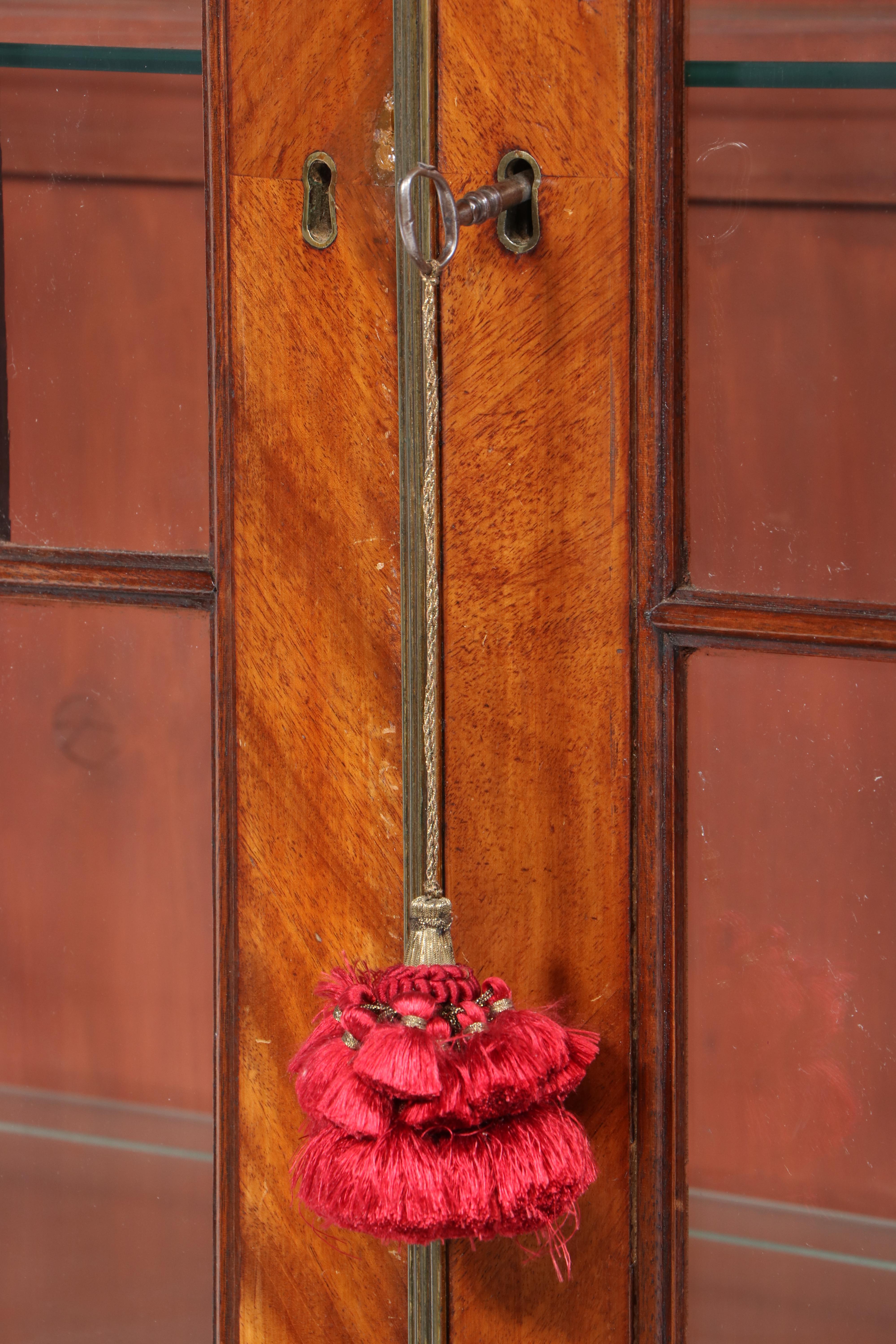 George III Mahogany and String-Inlaid Breakfront Bookcase, circa 1800