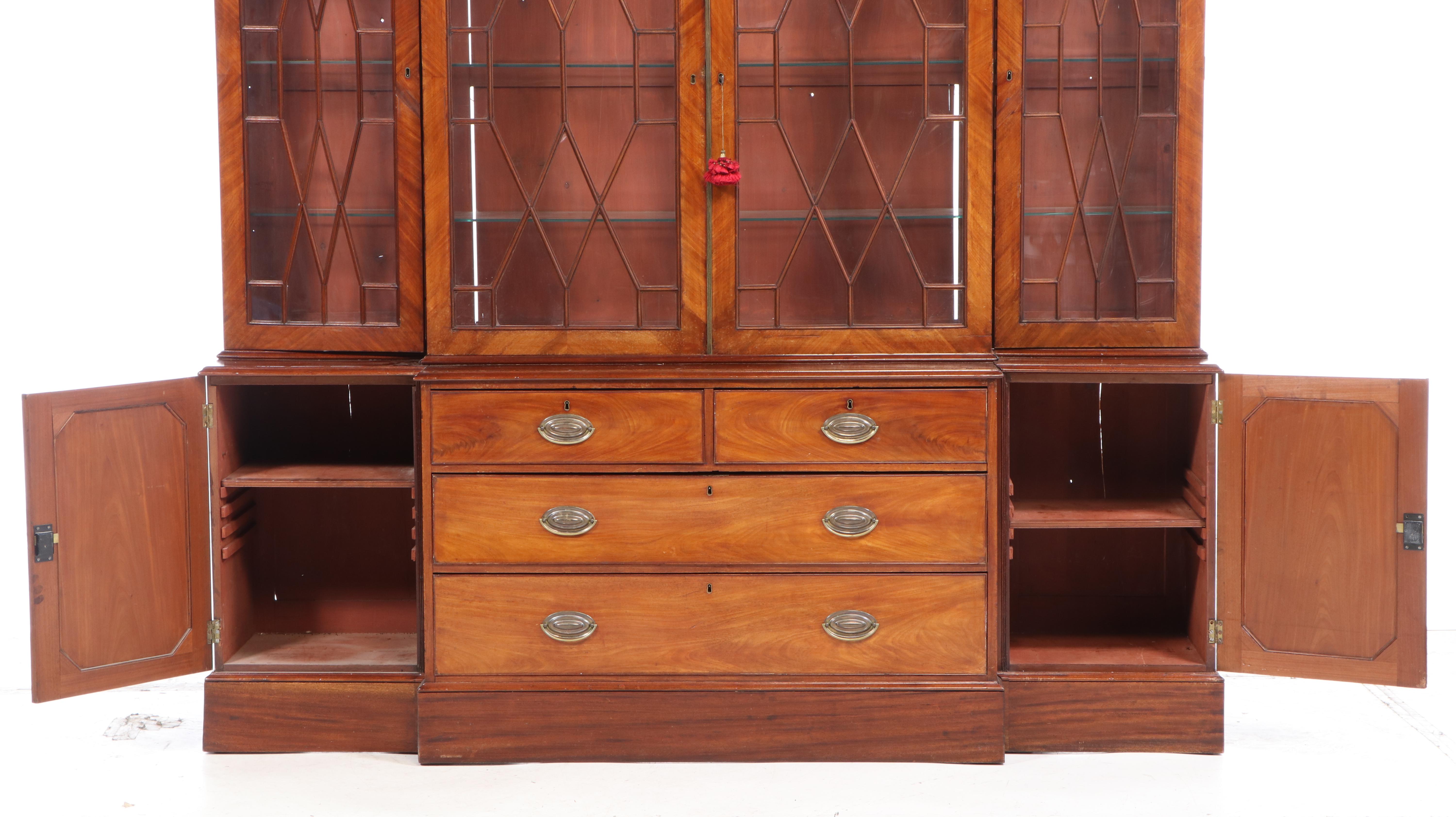 George III Mahogany and String-Inlaid Breakfront Bookcase, circa 1800