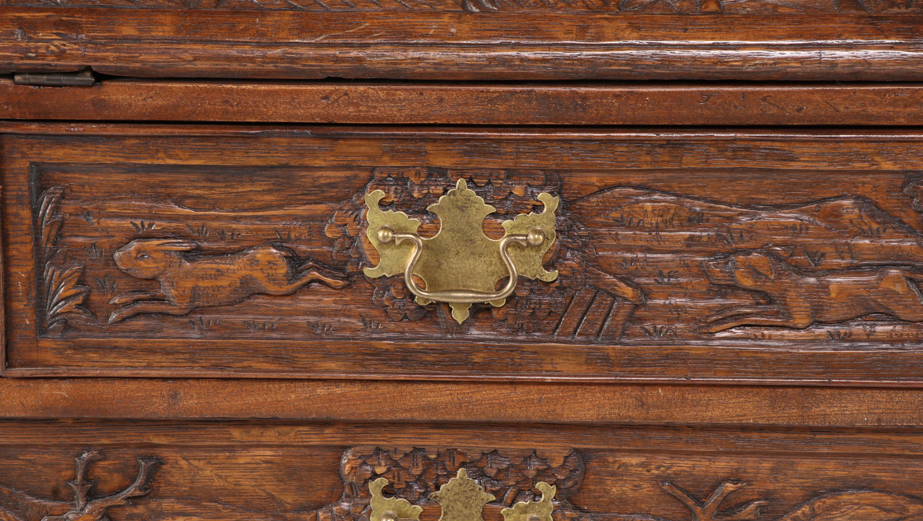 Relief-Carved Oak Bureau with Hunting Scenes, 20th Century
