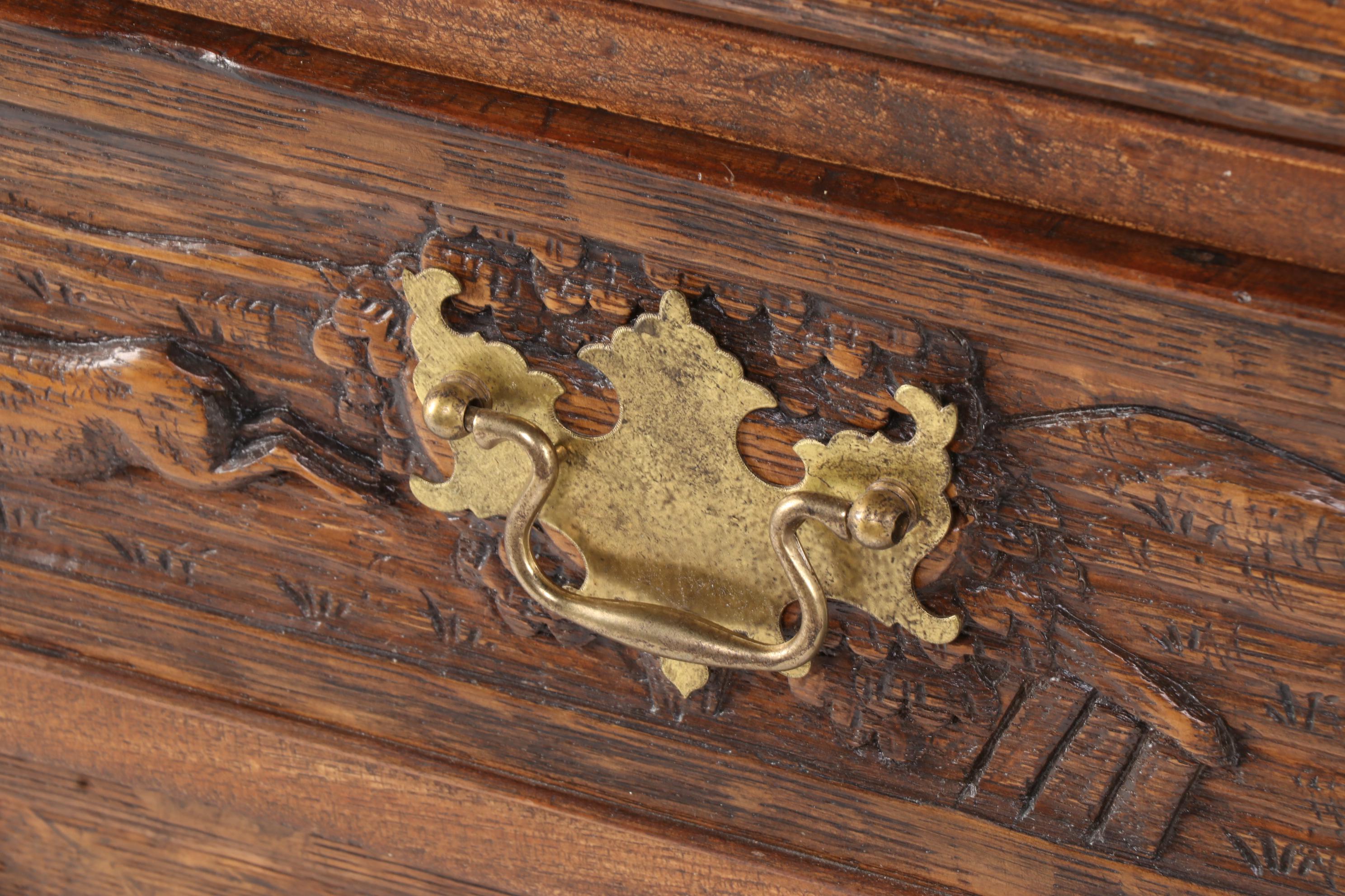 Relief-Carved Oak Bureau with Hunting Scenes, 20th Century