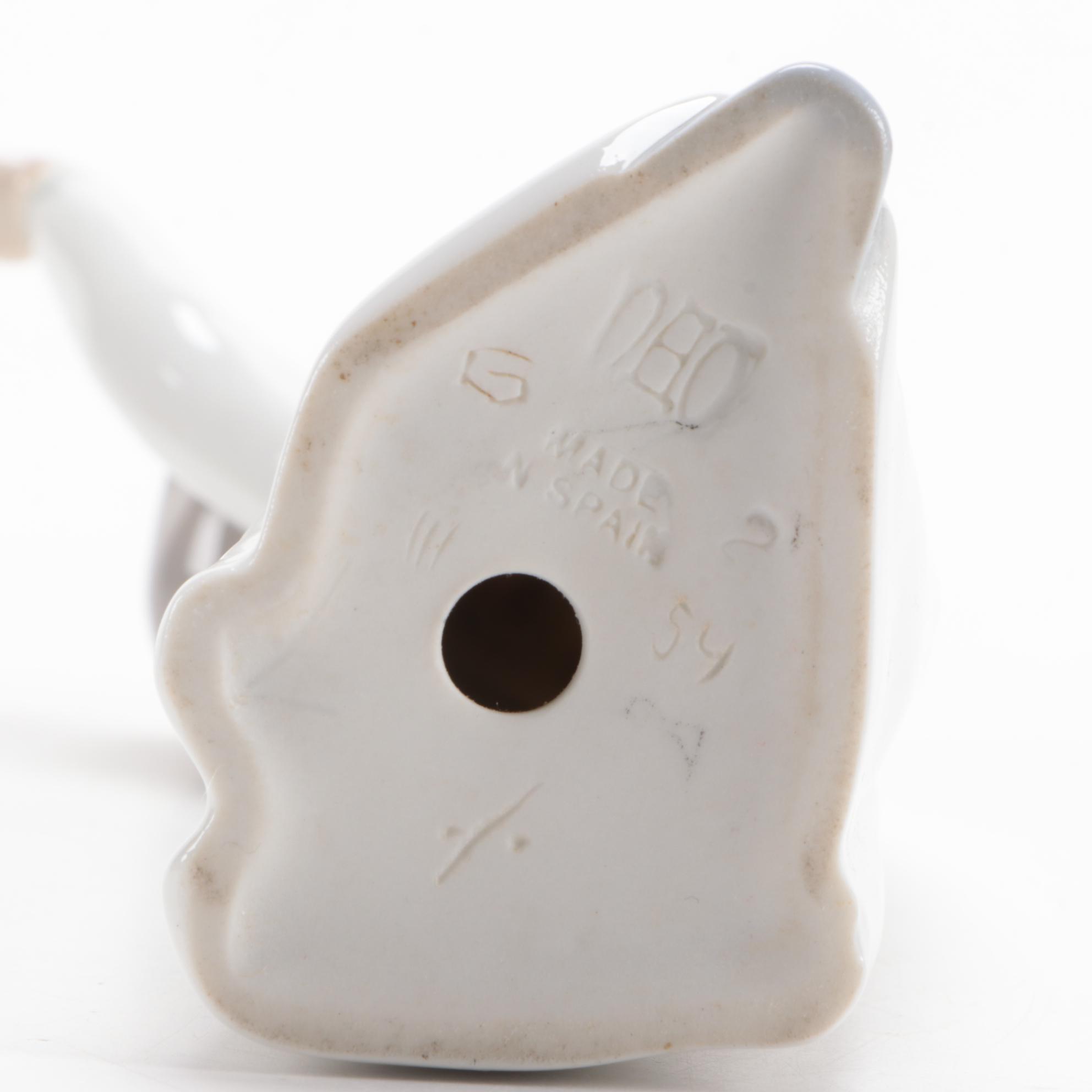 Nao "Boy Yawning" Porcelain Figurine