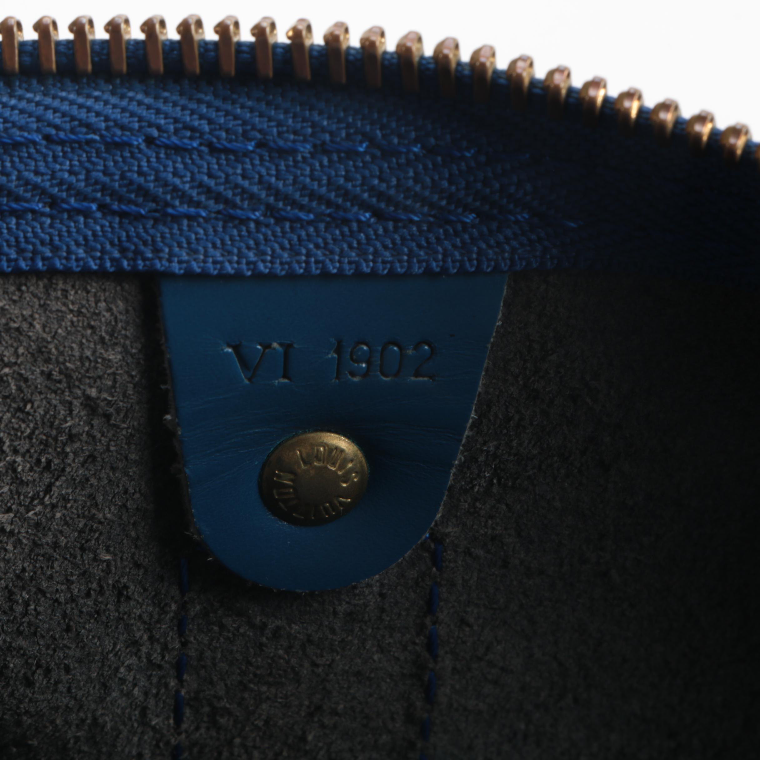 Louis Vuitton Keepall 55 Travel Bag in Toledo Blue Epi and Smooth Leather