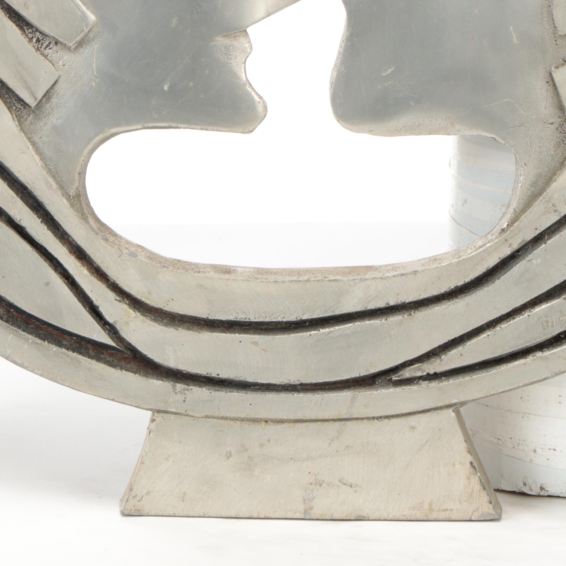 Carved Metal Silhouette Sculpture