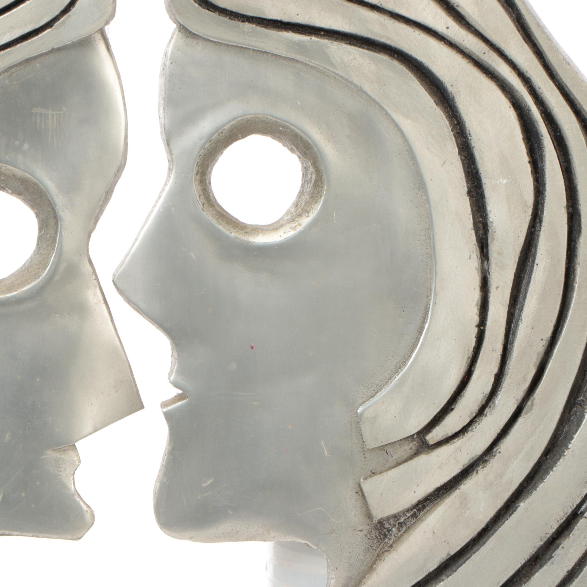 Carved Metal Silhouette Sculpture