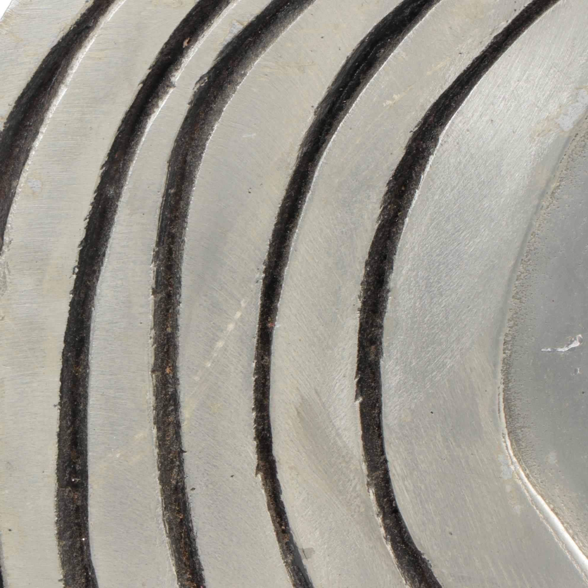 Carved Metal Silhouette Sculpture