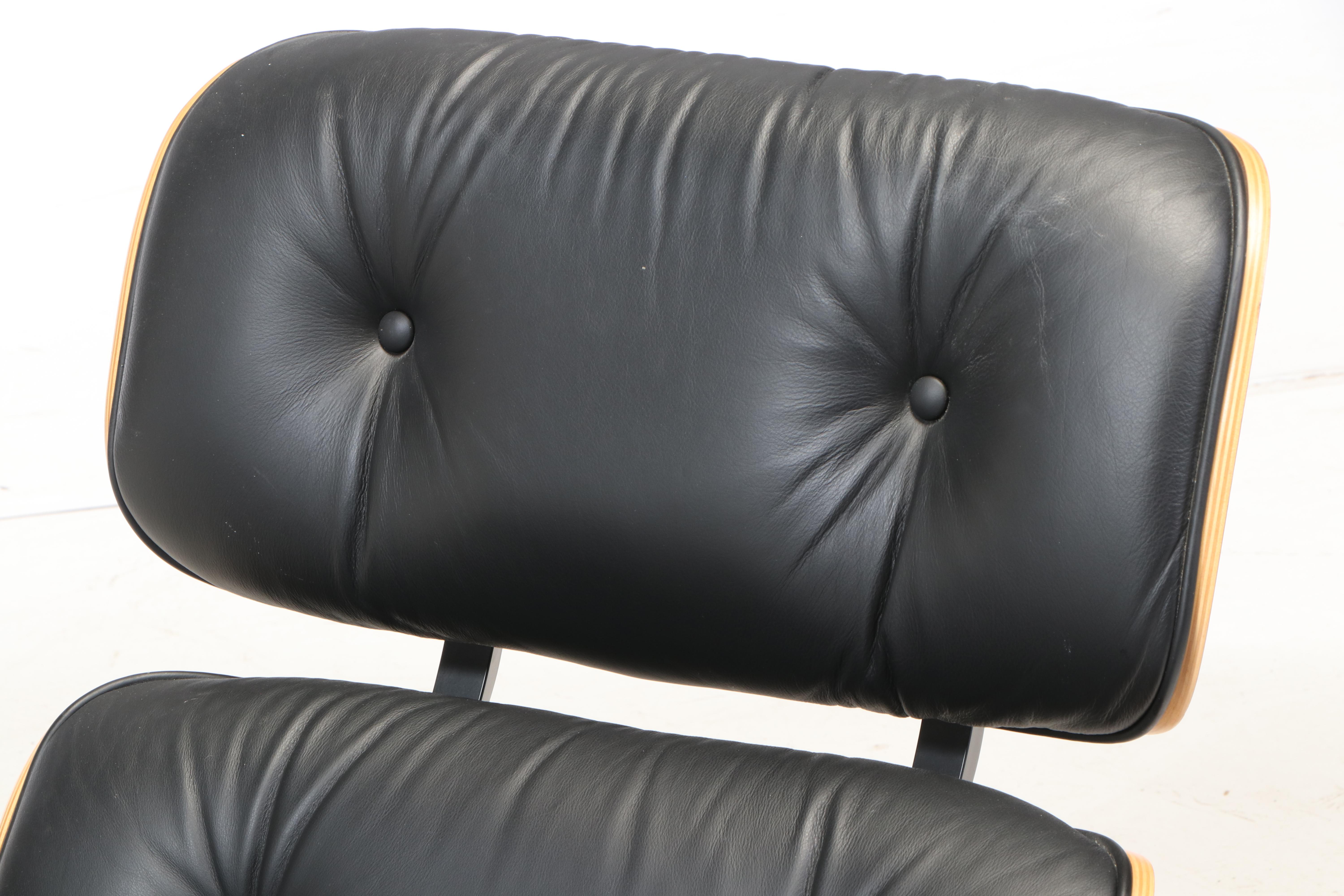 Charles & Ray Eames for Herman Miller Laminated Walnut Lounge Chair and Ottoman