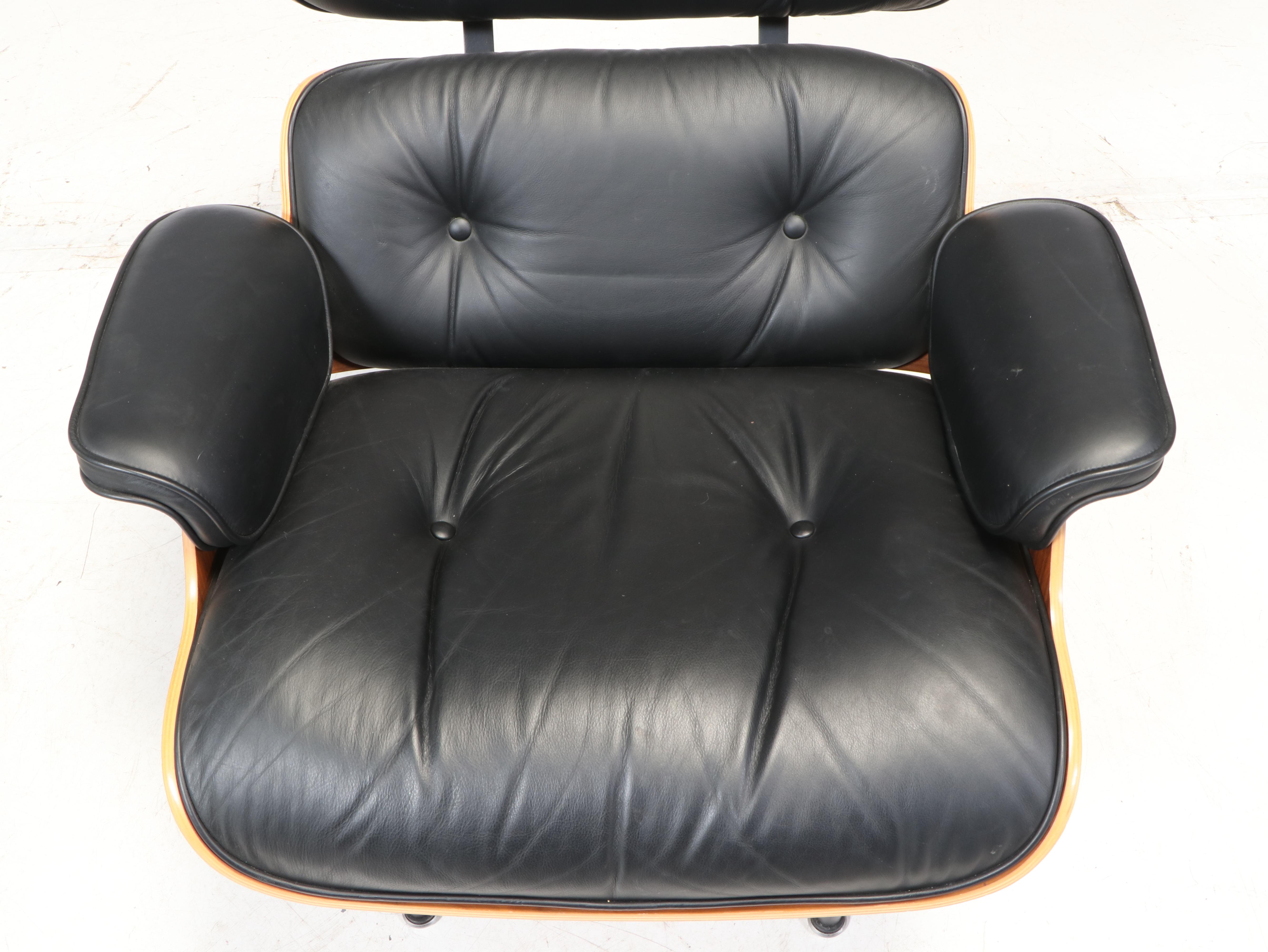 Charles & Ray Eames for Herman Miller Laminated Walnut Lounge Chair and Ottoman