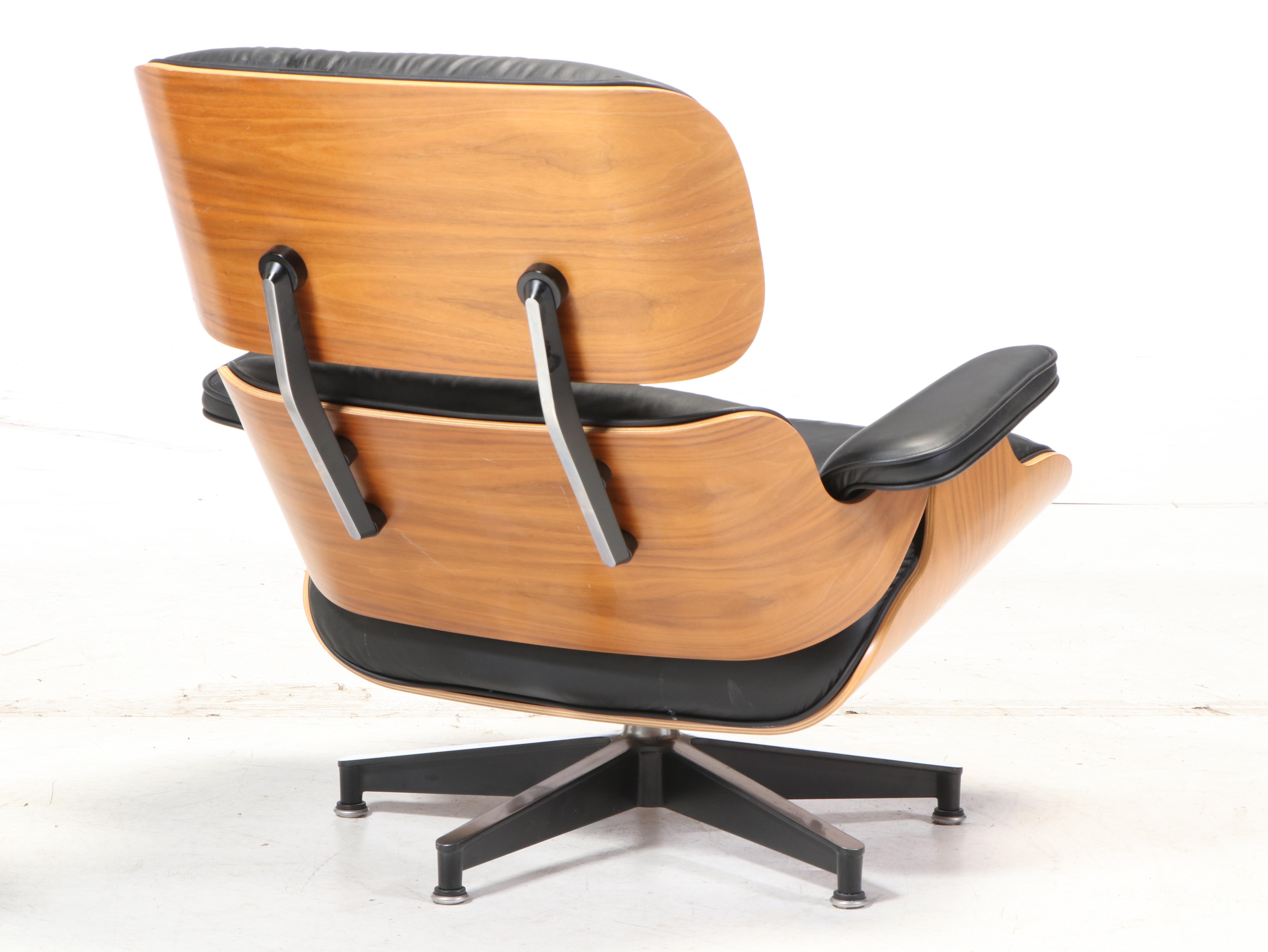 Charles & Ray Eames for Herman Miller Laminated Walnut Lounge Chair and Ottoman