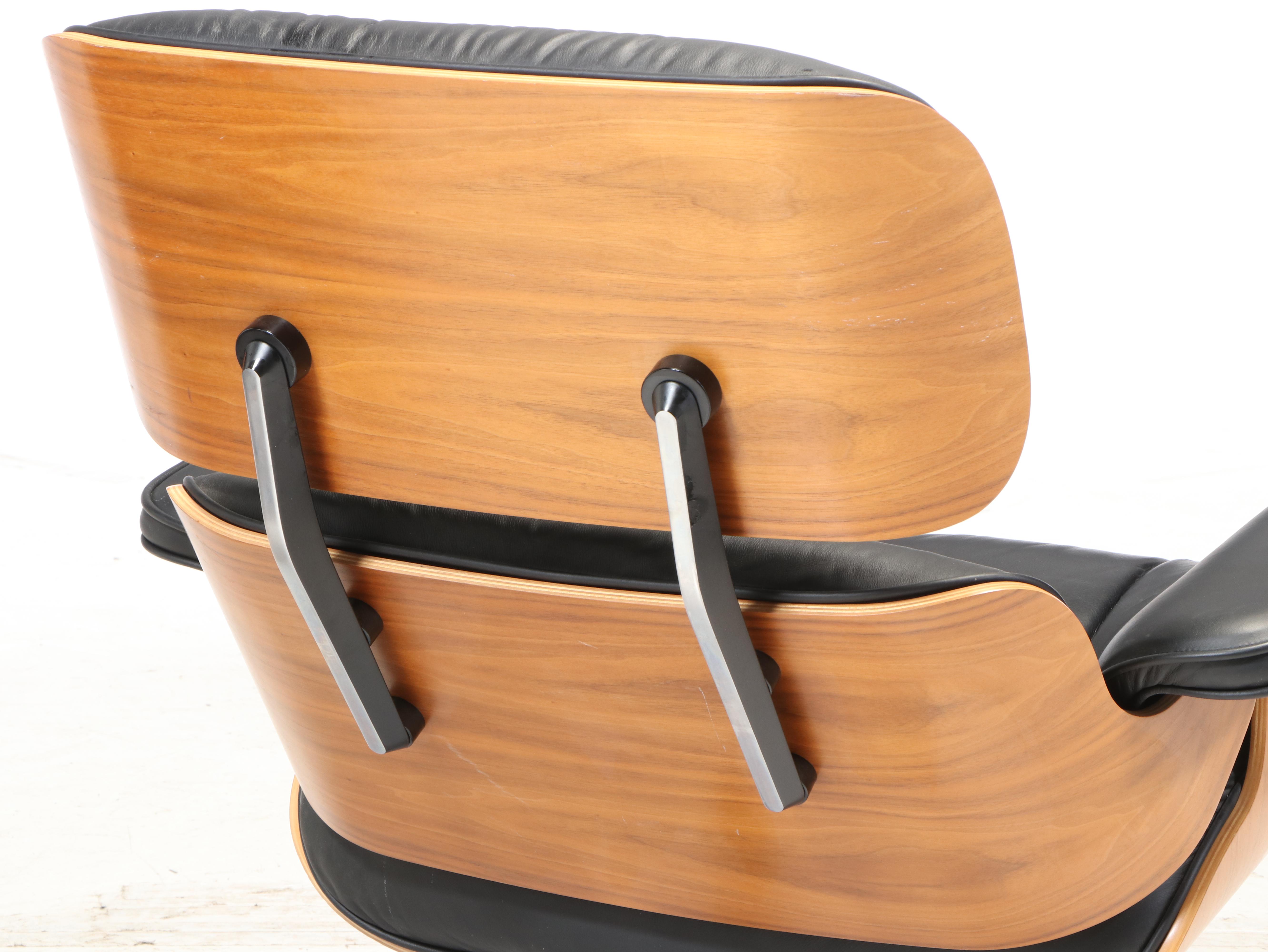 Charles & Ray Eames for Herman Miller Laminated Walnut Lounge Chair and Ottoman