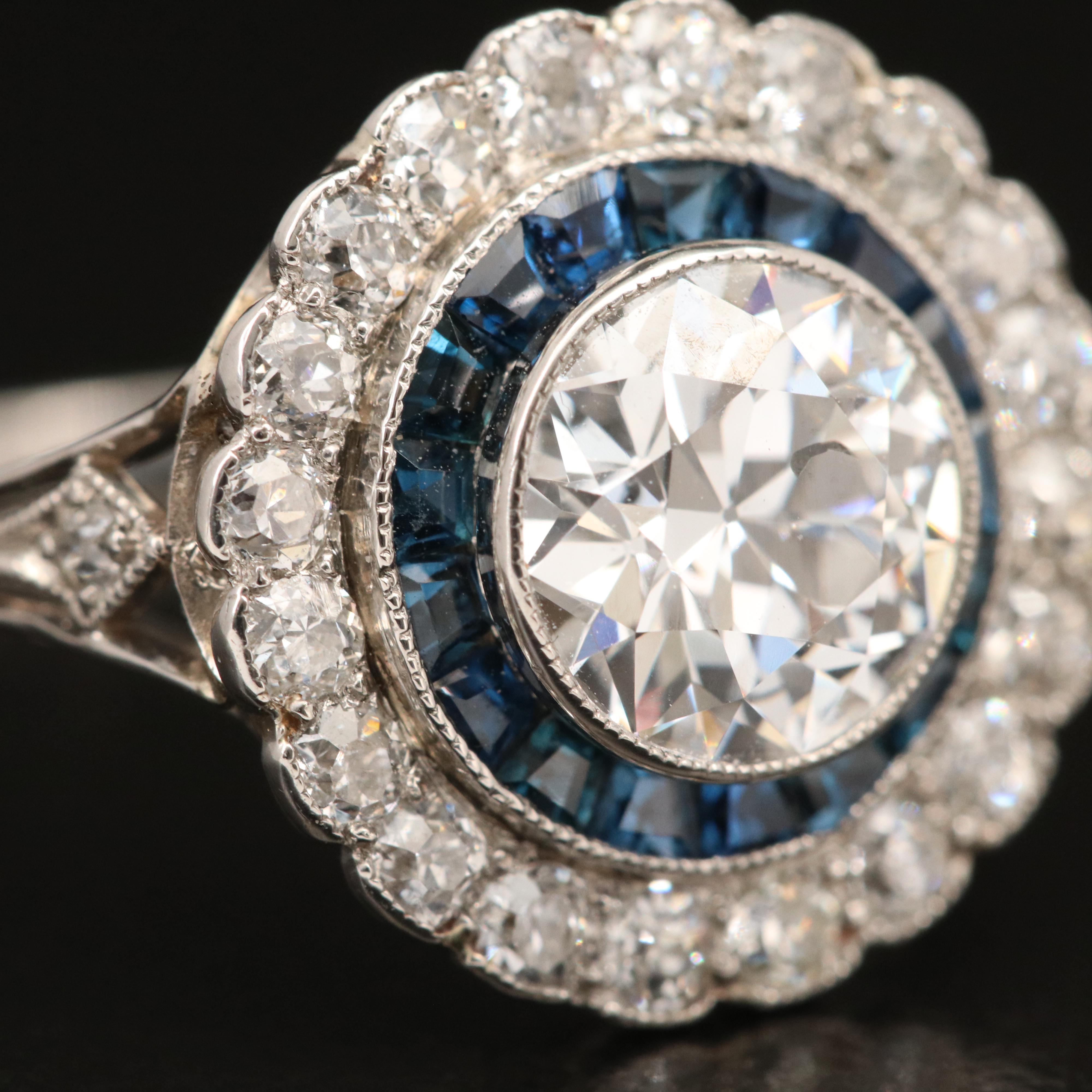 Art Deco Platinum 2.00 CTW Diamond and Sapphire Halo Ring