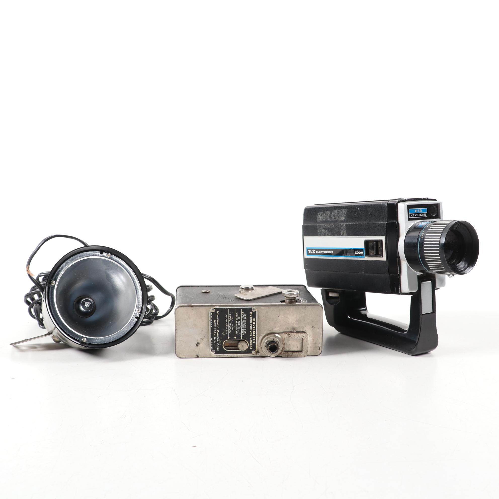 "Moviematic" and "TLX Electric Eye" Movie Cameras with "Sun Gun" Movie Light