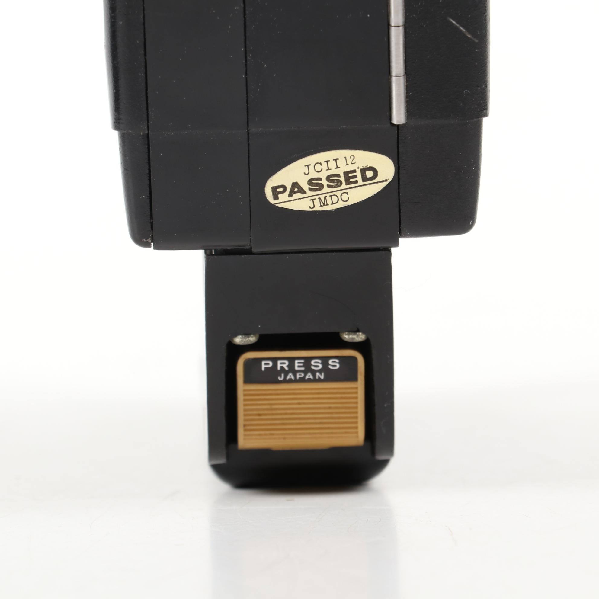 "Moviematic" and "TLX Electric Eye" Movie Cameras with "Sun Gun" Movie Light