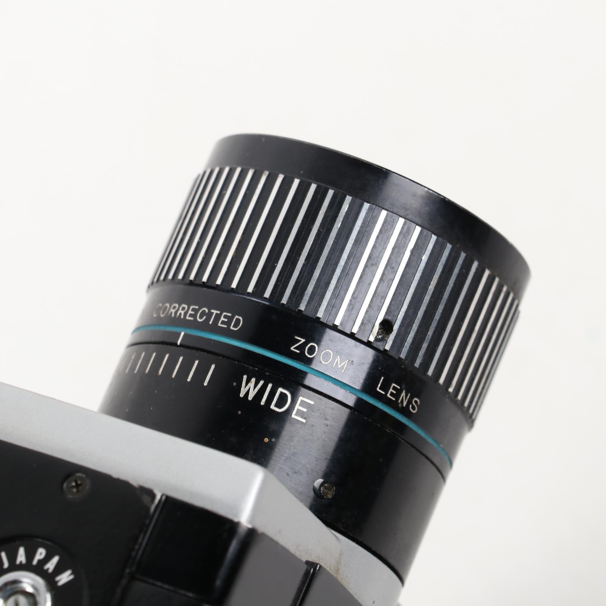 "Moviematic" and "TLX Electric Eye" Movie Cameras with "Sun Gun" Movie Light