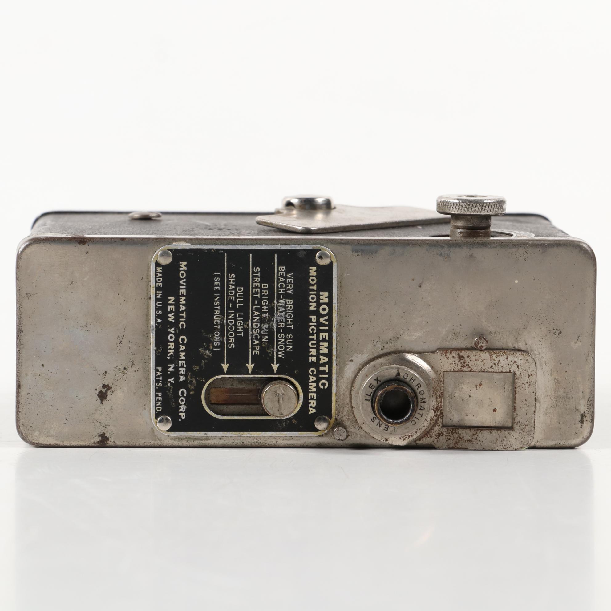 "Moviematic" and "TLX Electric Eye" Movie Cameras with "Sun Gun" Movie Light