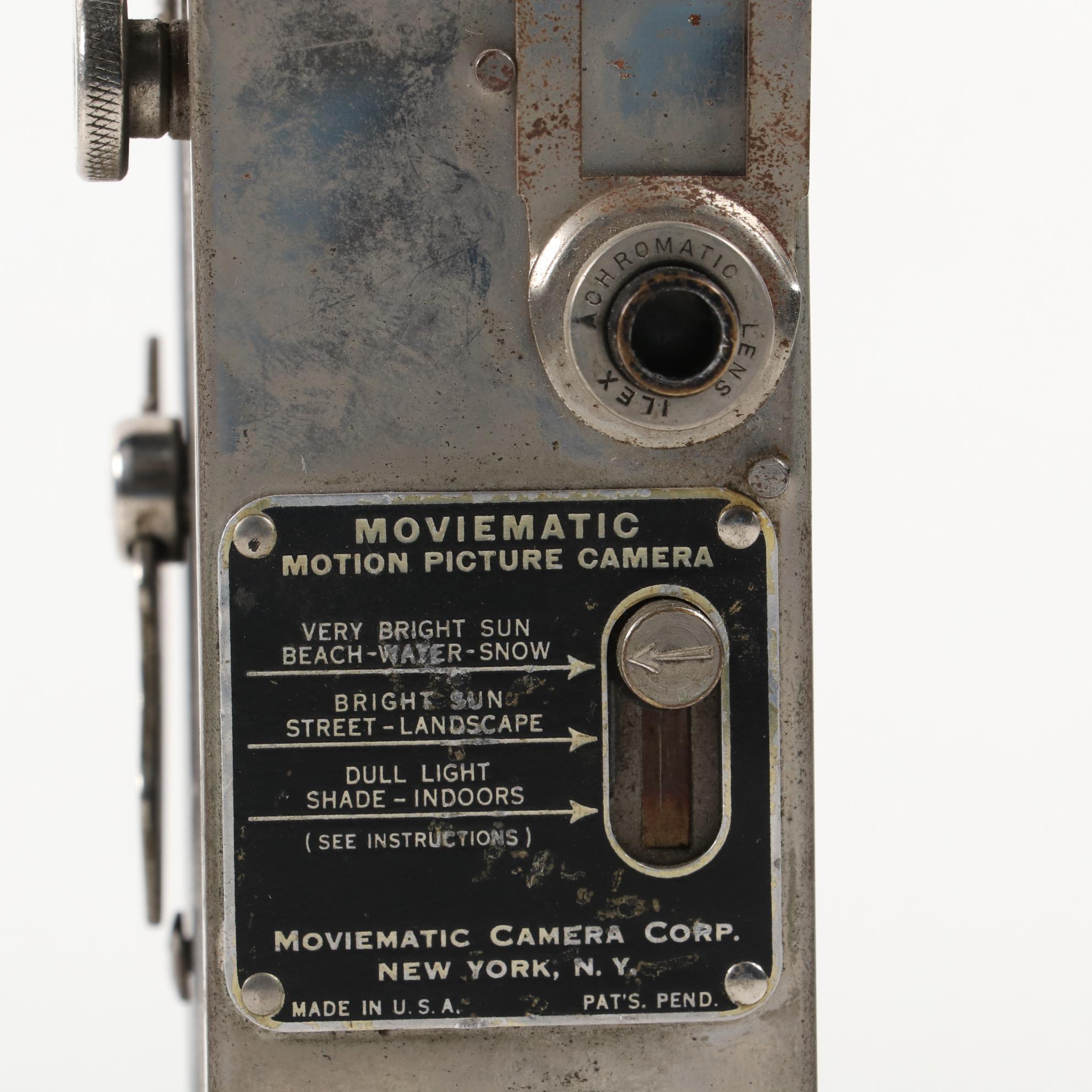 "Moviematic" and "TLX Electric Eye" Movie Cameras with "Sun Gun" Movie Light