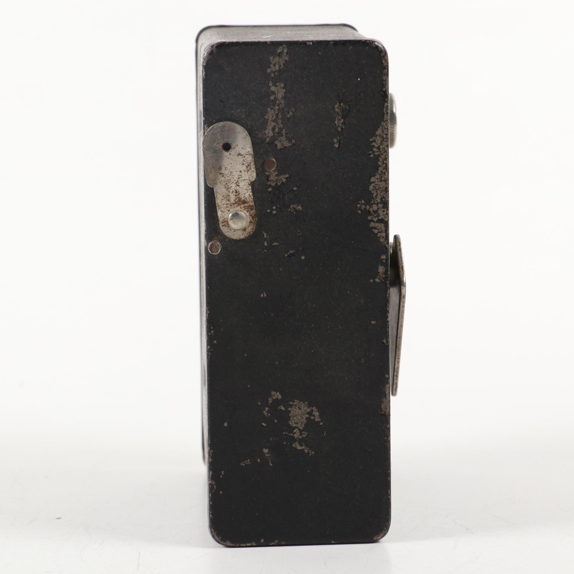 "Moviematic" and "TLX Electric Eye" Movie Cameras with "Sun Gun" Movie Light