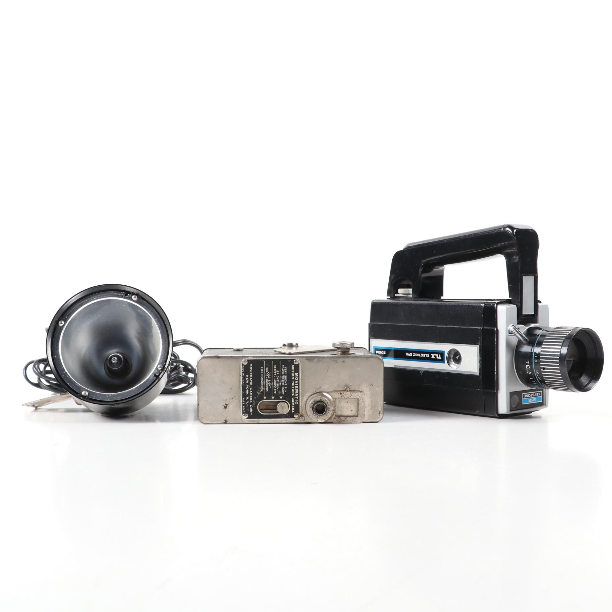 "Moviematic" and "TLX Electric Eye" Movie Cameras with "Sun Gun" Movie Light