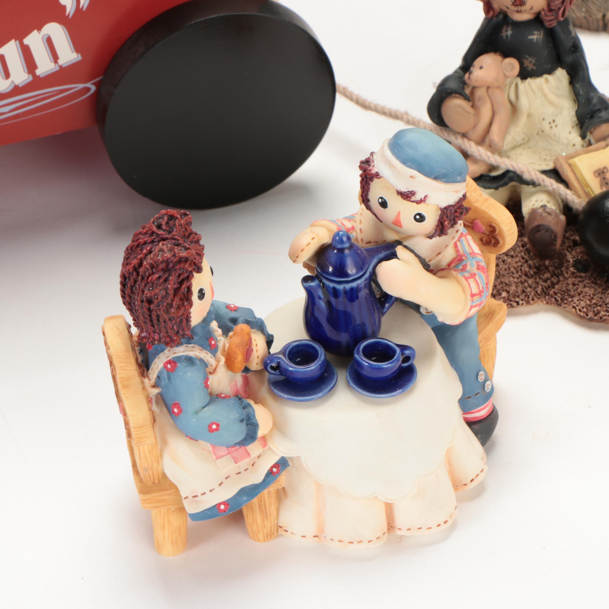 Enesco and Other Raggedy Ann & Andy Figurines with Display Shelves