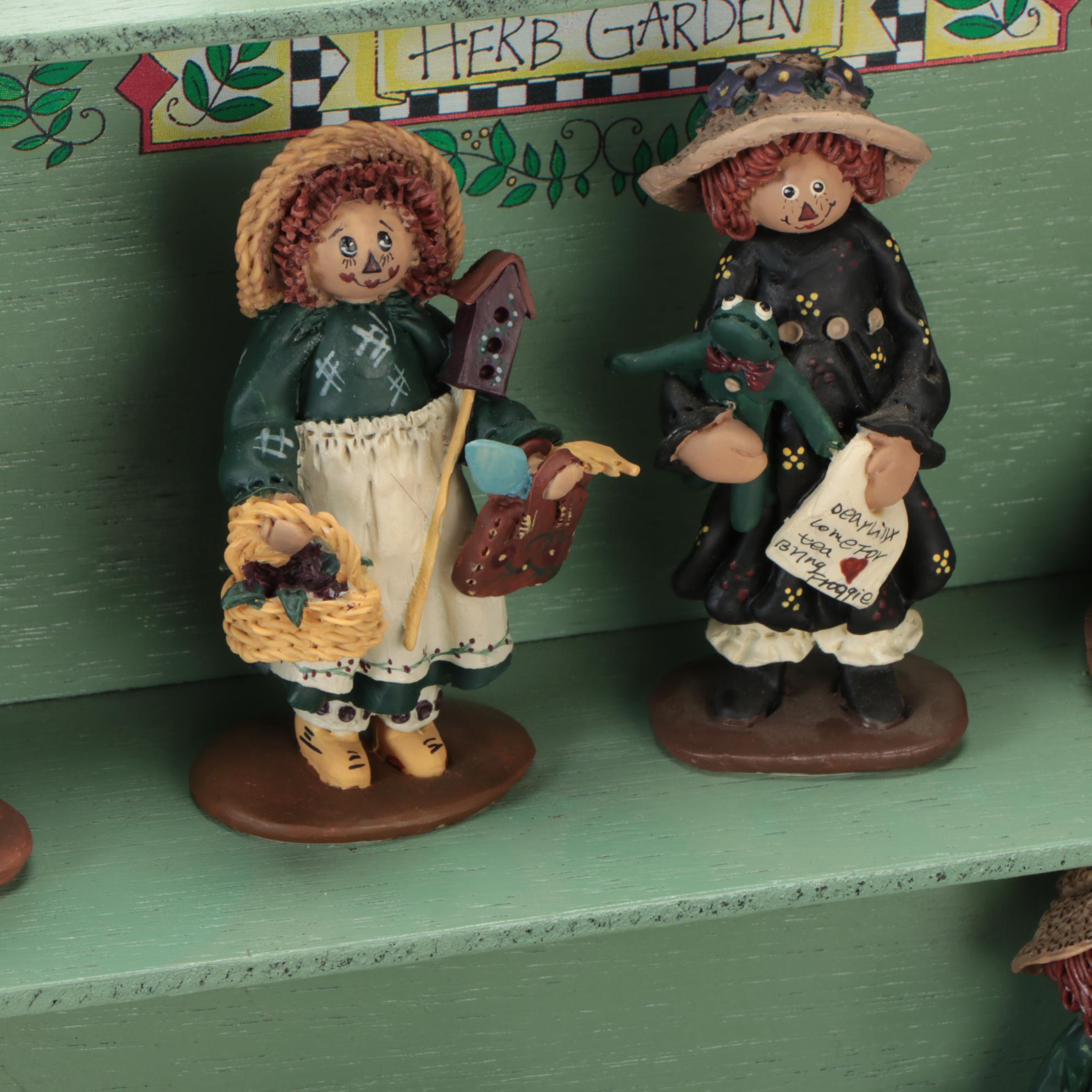 Enesco and Other Raggedy Ann & Andy Figurines with Display Shelves