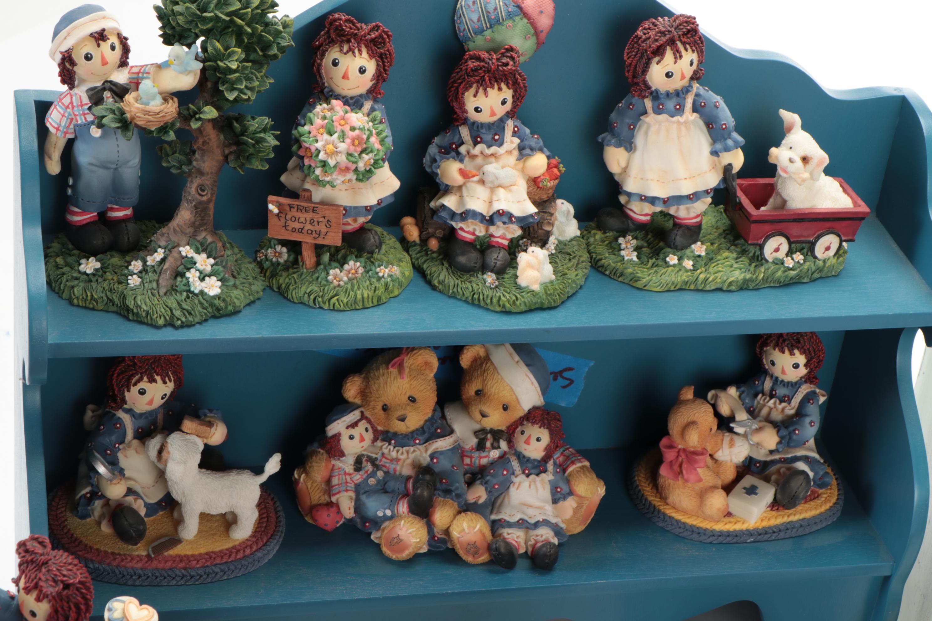 Enesco and Other Raggedy Ann & Andy Figurines with Display Shelves