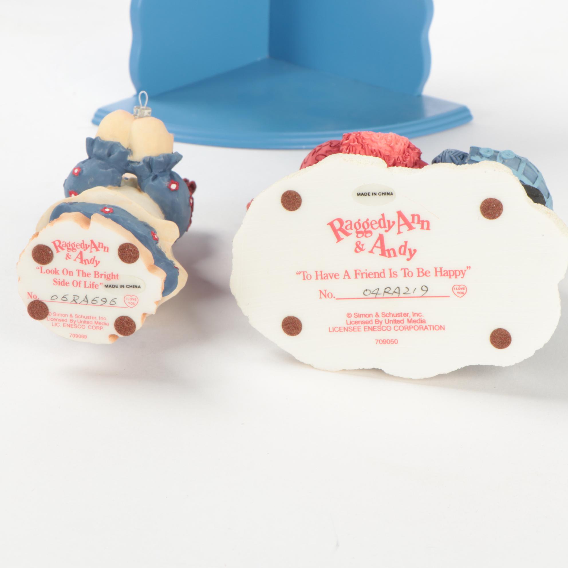 Enesco and Other Raggedy Ann & Andy Figurines with Display Shelves