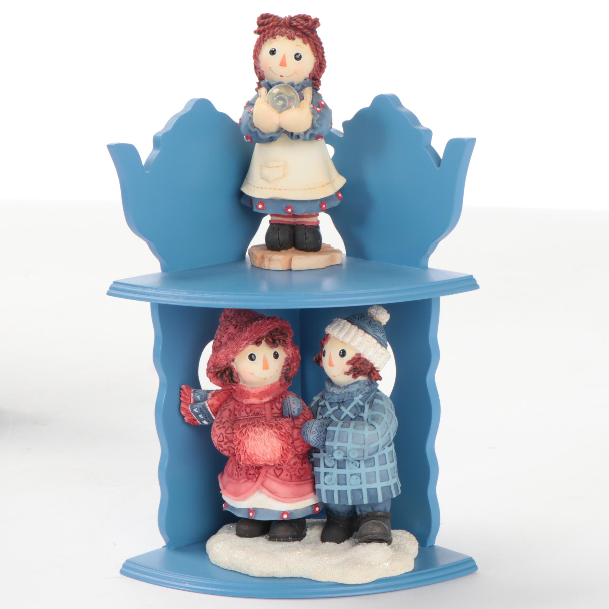 Enesco and Other Raggedy Ann & Andy Figurines with Display Shelves