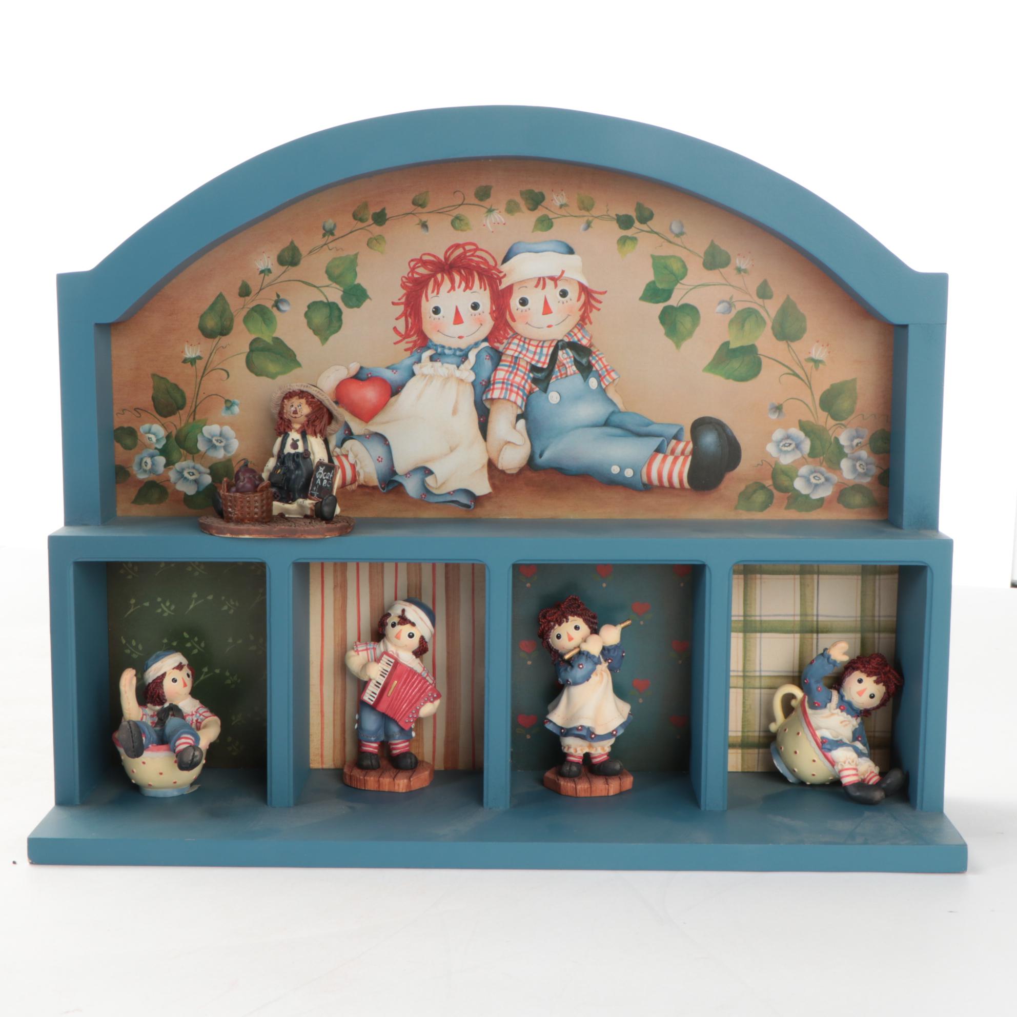 Enesco and Other Raggedy Ann & Andy Figurines with Display Shelves